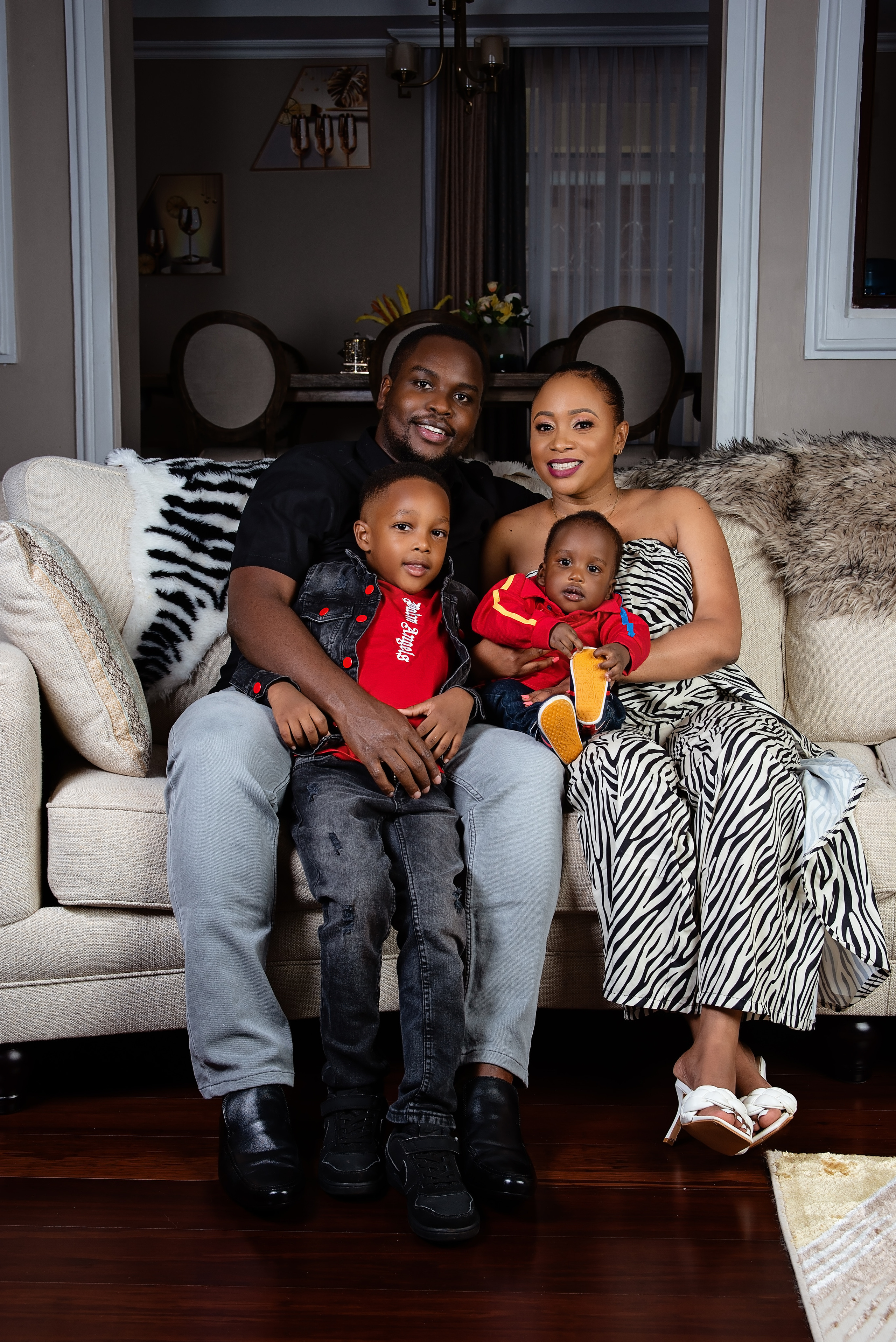 Black family father mother 5 years and 10 months brothers