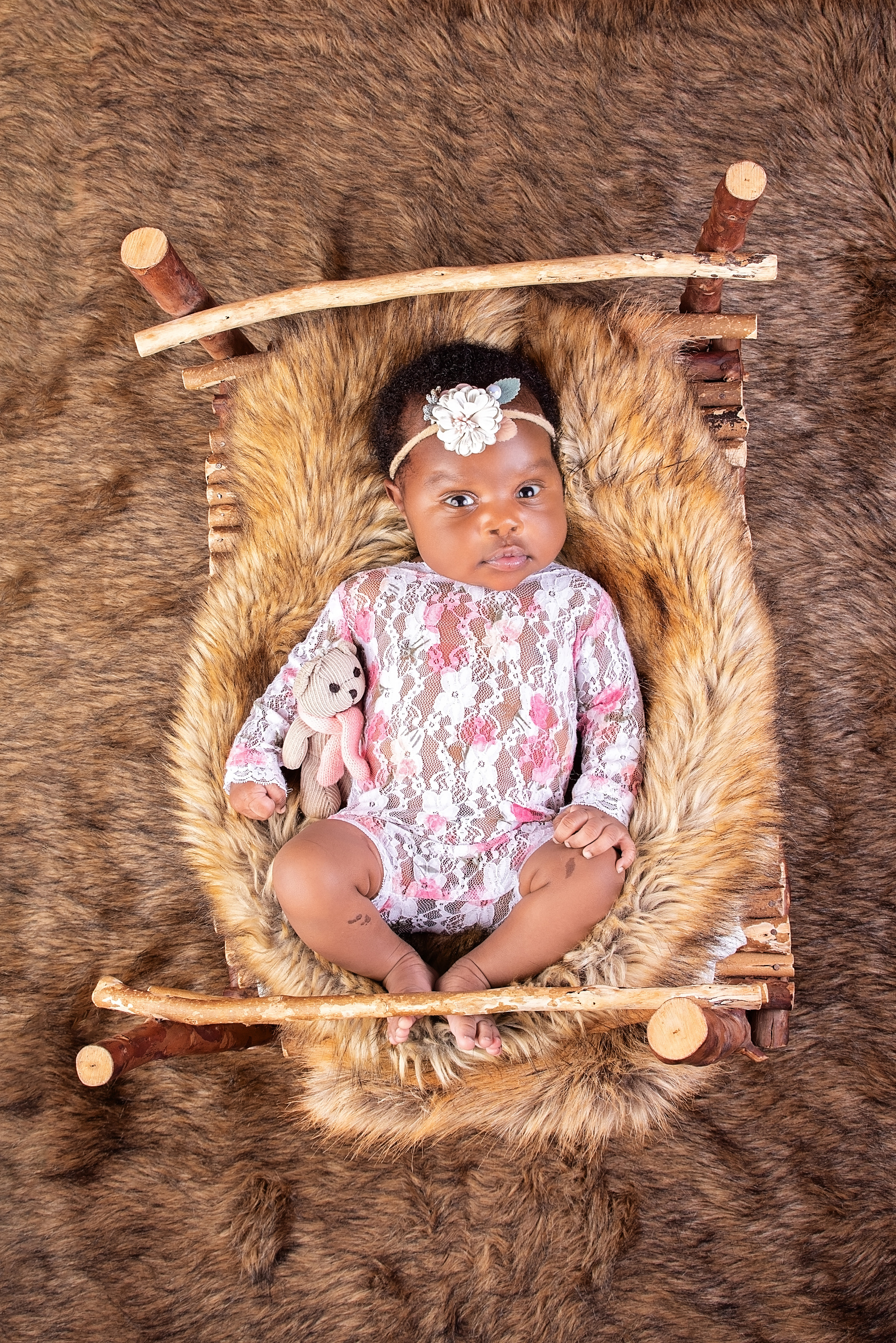 Black baby girl laying in the bed Nairobi Kenya