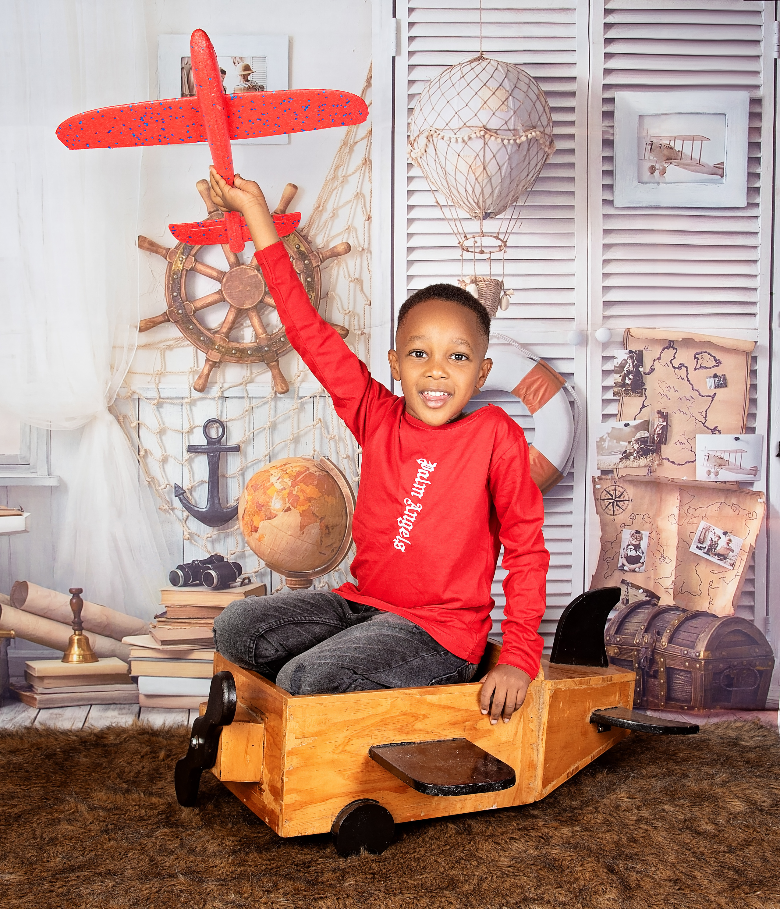 Black 5 year old boy kid photo shoot with the plane Nairobi Kenya 