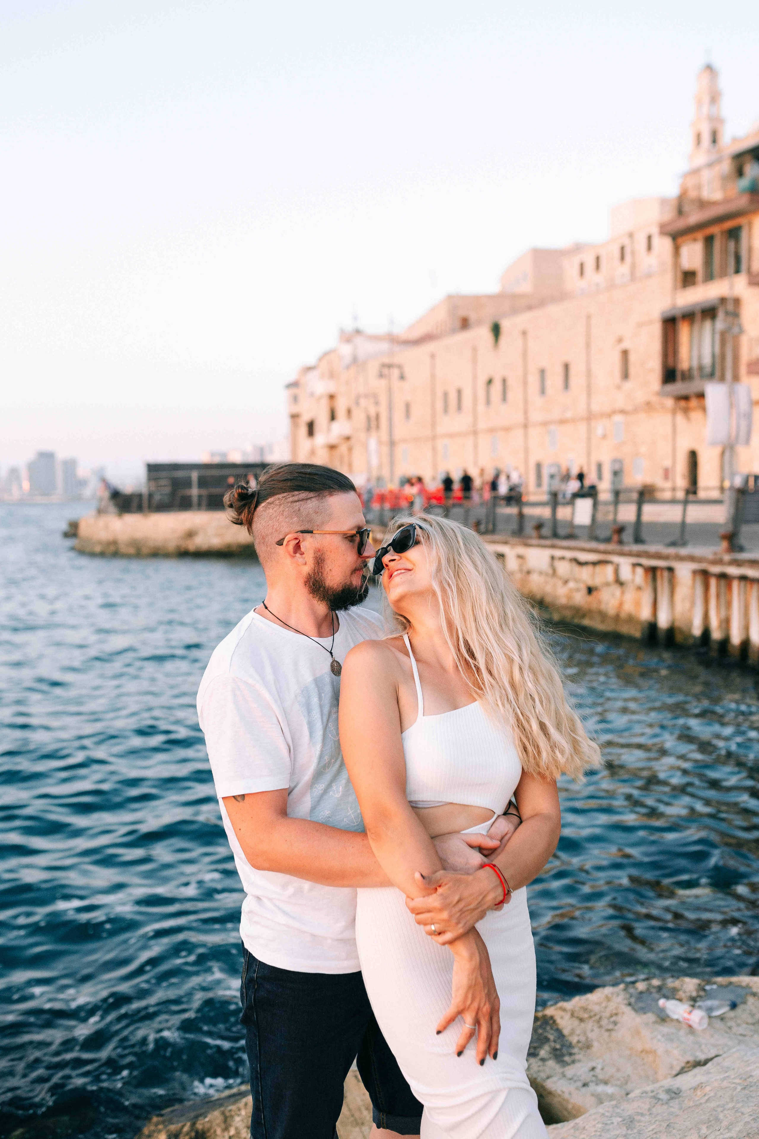 SUNSET IN JAFFO PORT. PHOTOGRAPHER IN ISRAEL