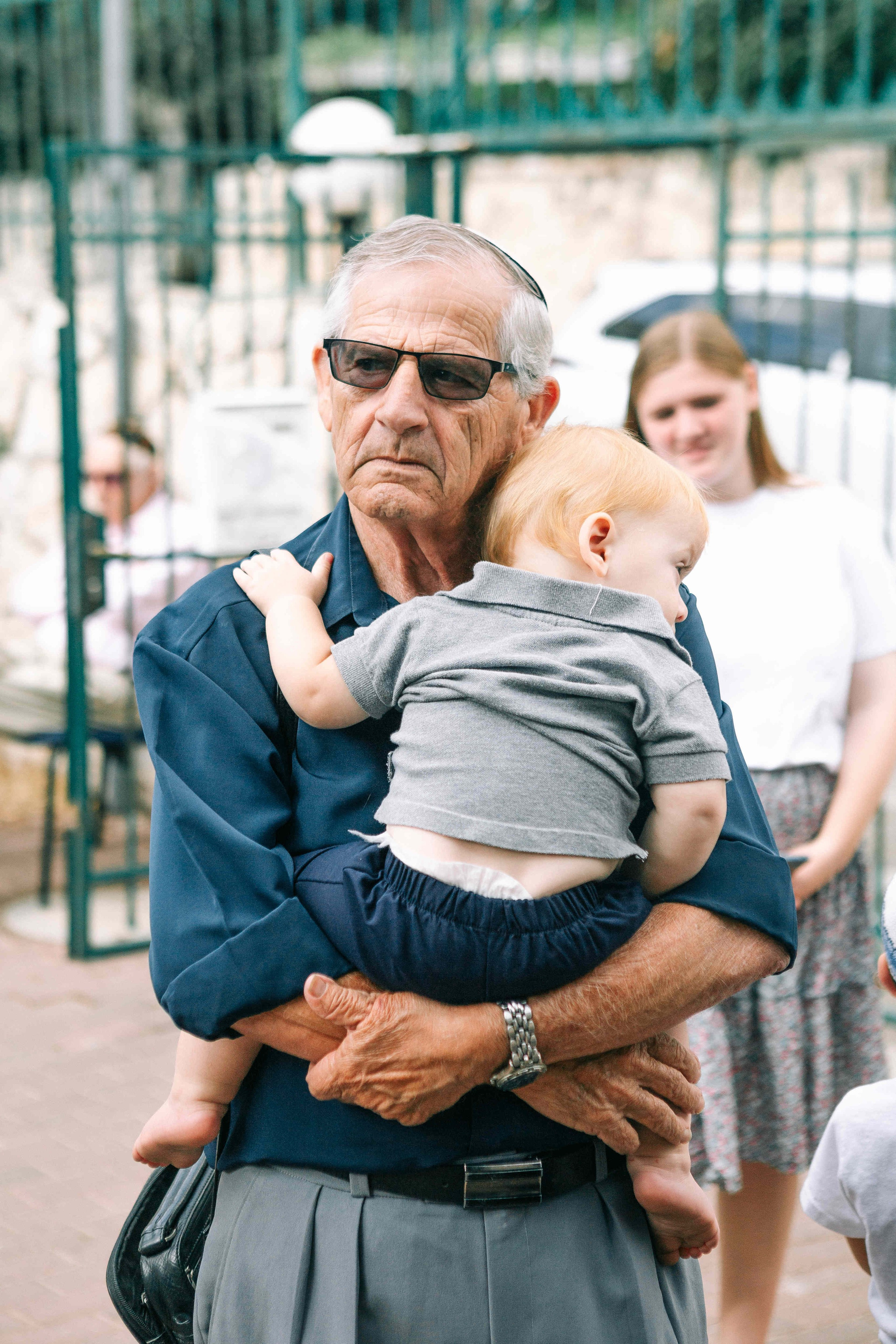 BRITH MILA IN THE SMALL SYNAGOGUE. PHOTOGRAPHER IN ISRAEL