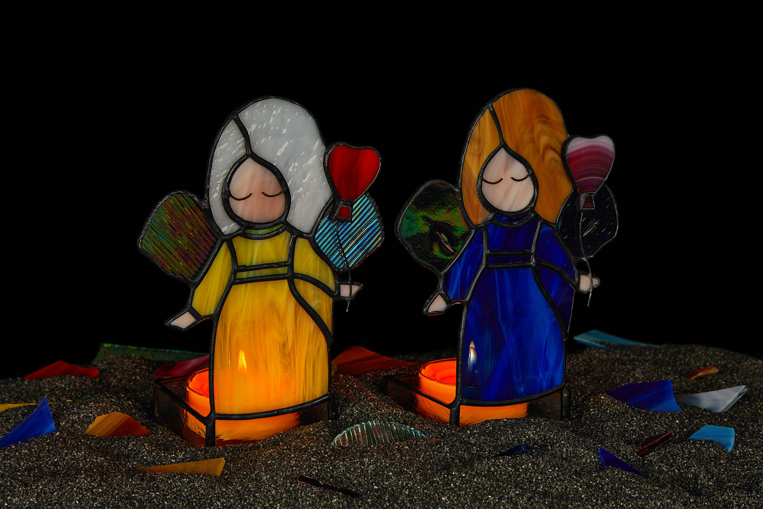 Photographer Roman Djuzev - Photograph of stained glass Angels on a dark background, stained glass artist Tatyana Velichkina.