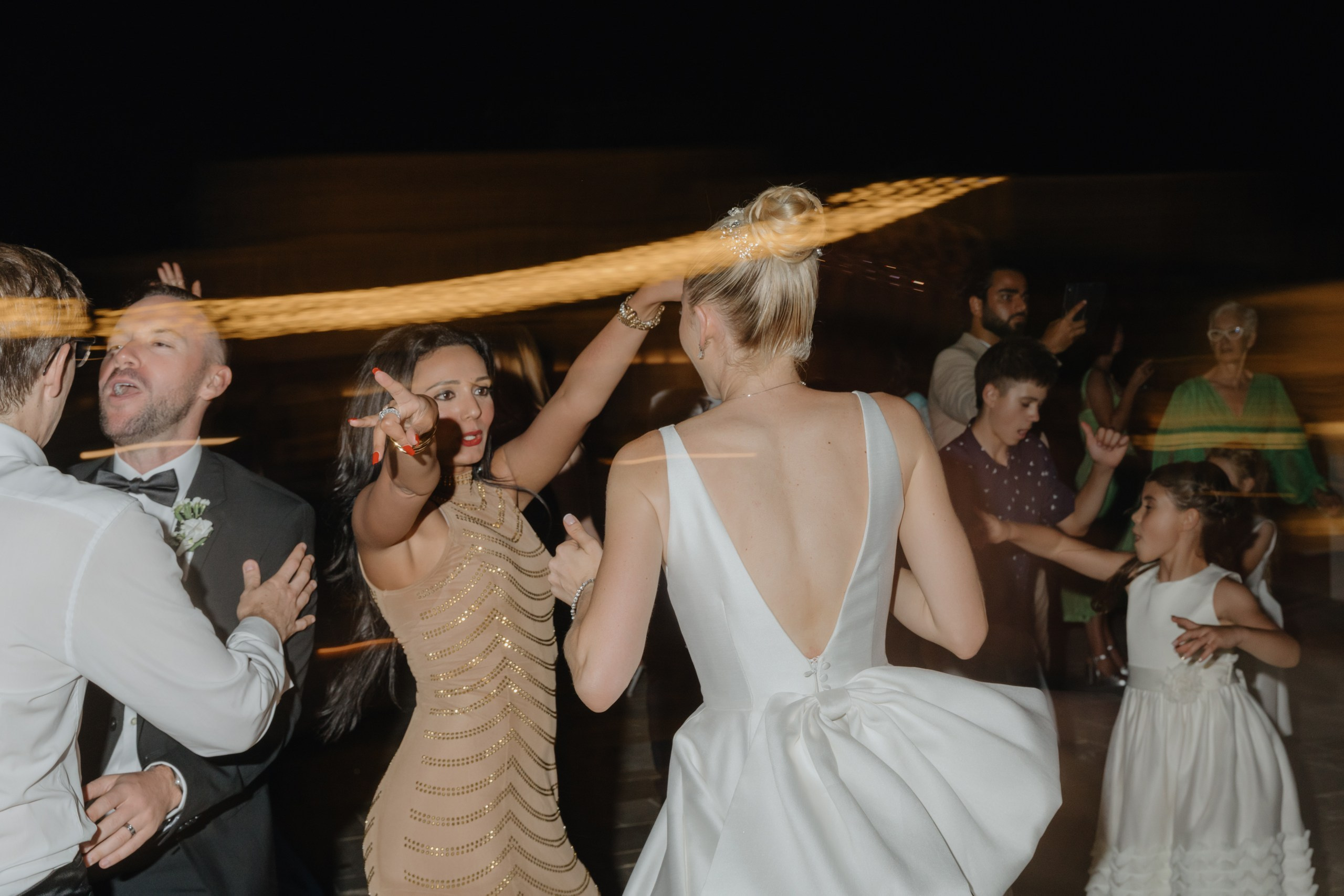 Guests dancing at Italian destination wedding reception in Puglia