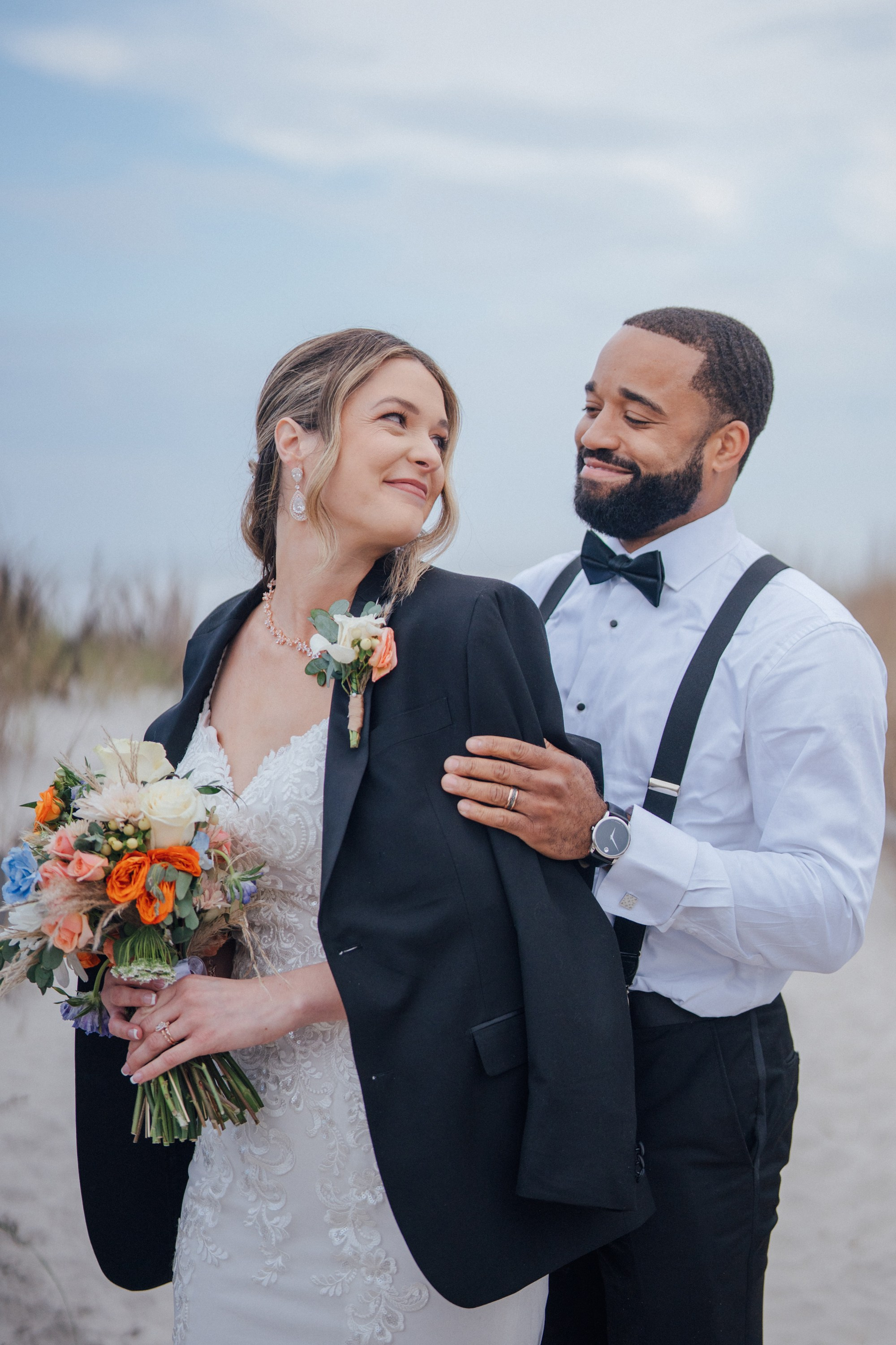 Wedding walk on the beach. Portrait and wedding photographer in New York