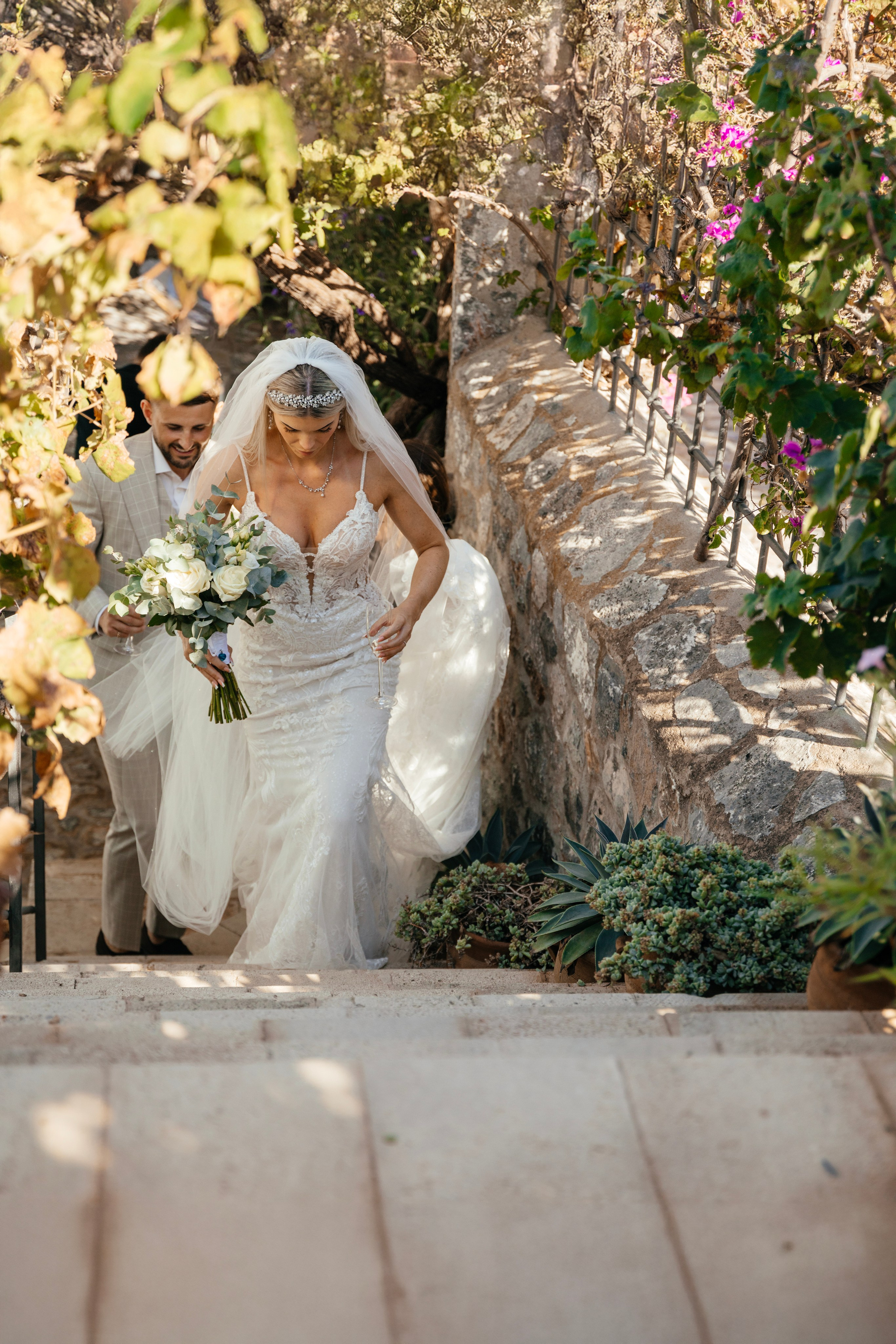 The couple is happy after the ceremony in Lindos, Rhodes, Greece