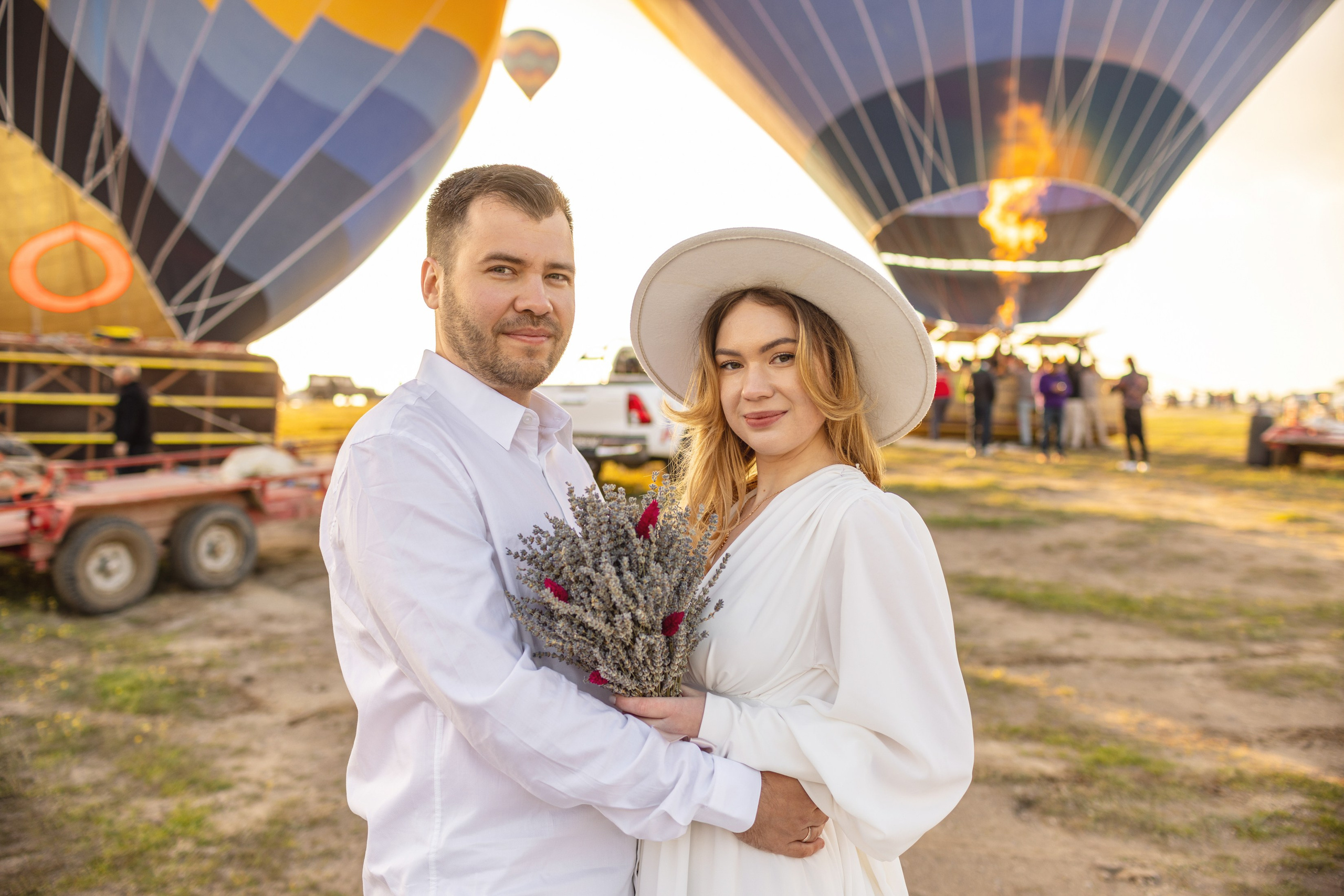Elegant Wedding Photoshoot with a Flowing Dress and Balloons in Cappadocia. Julia Ganch I Fashion Wedding Photography I Cappadocia Turkey