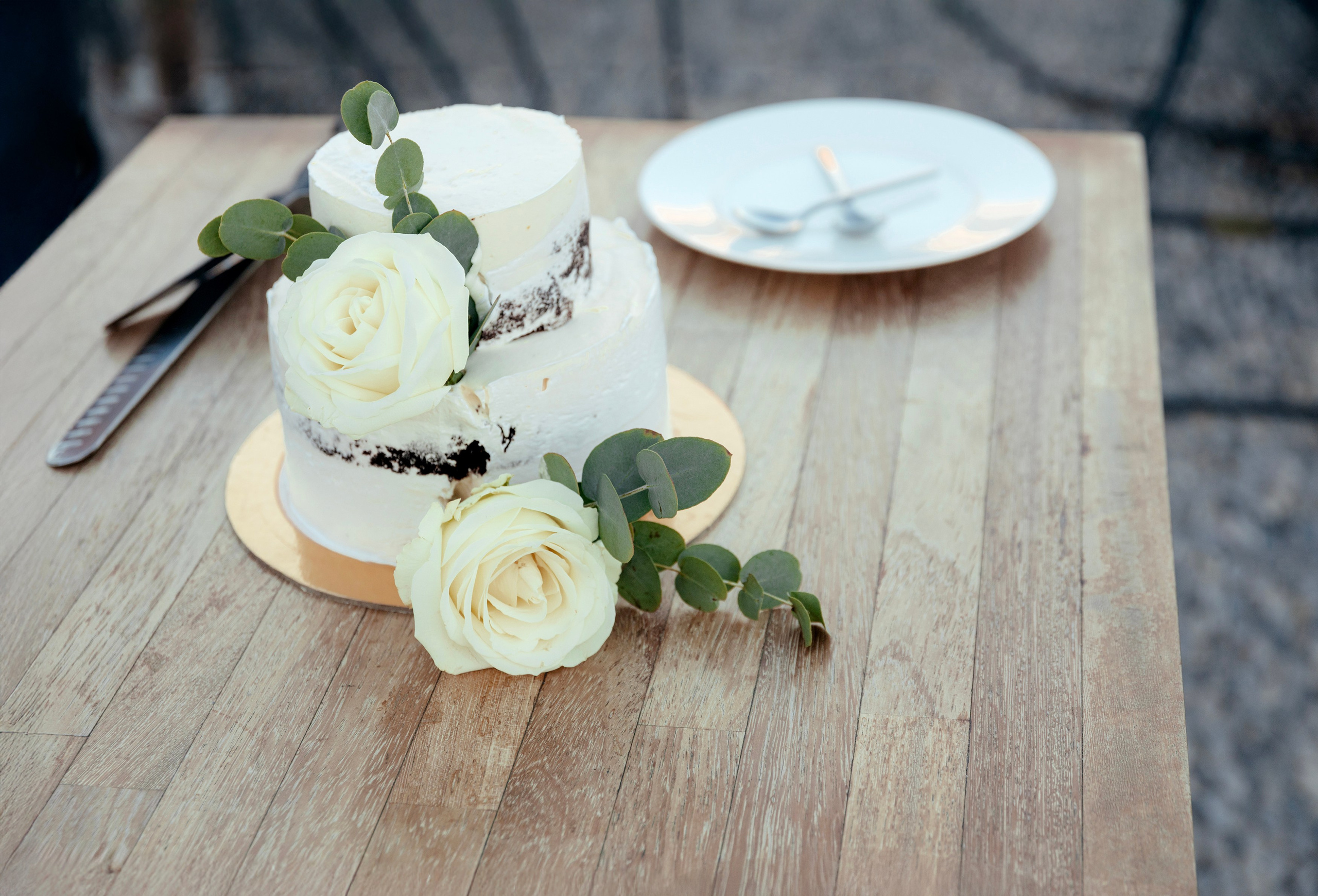 Wedding cake at a wedding in a rustic bar in Lindos, Greece.