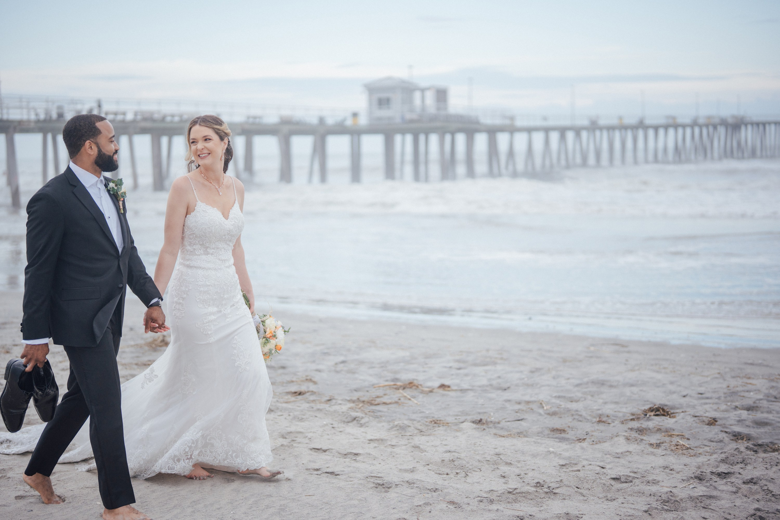 Wedding walk on the beach. Portrait and wedding photographer in New York