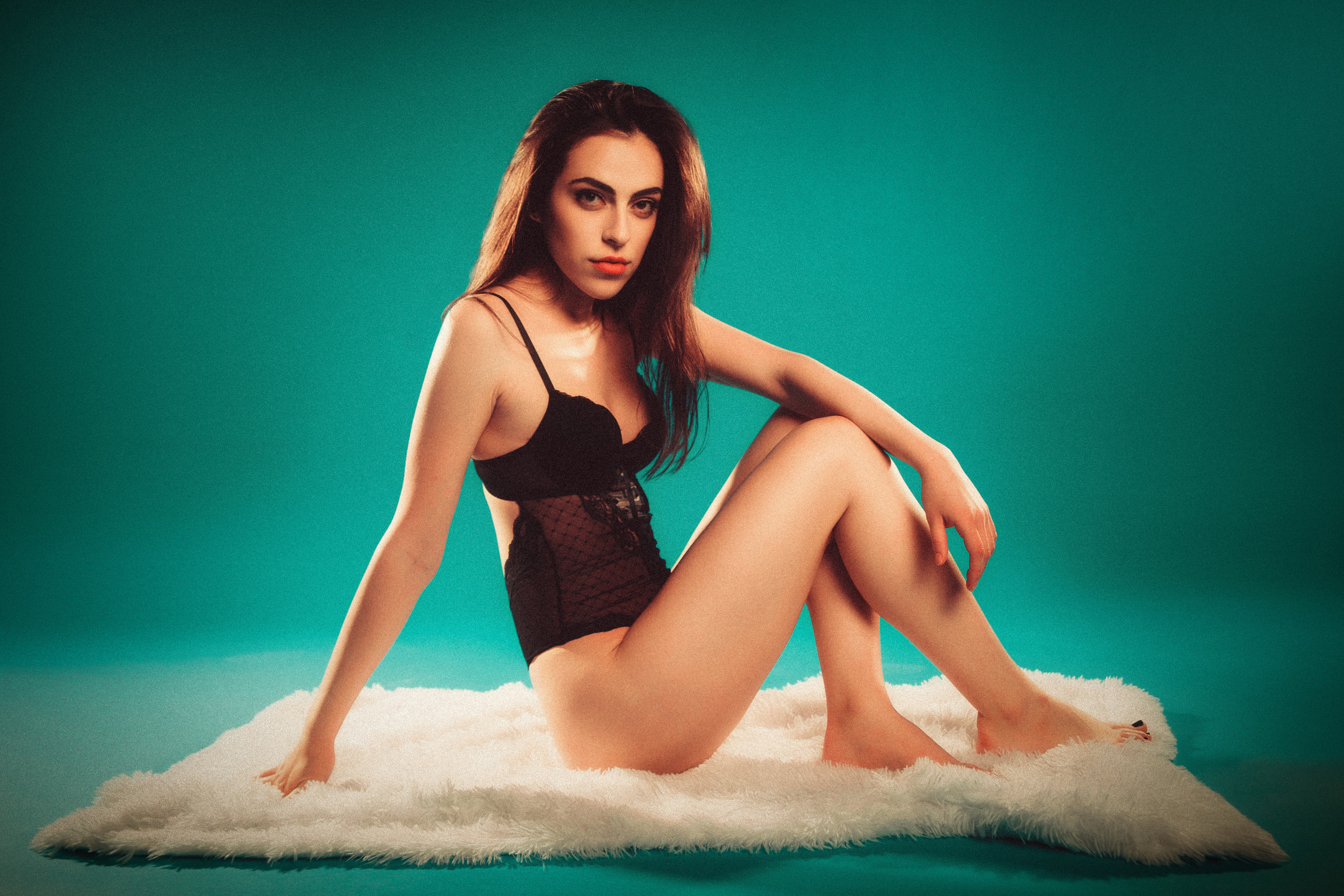 Portrait of a beautiful girl with a sexy body in underwear in a photo studio, on a green background, Dmitry Ilkov, photographer Edmonton