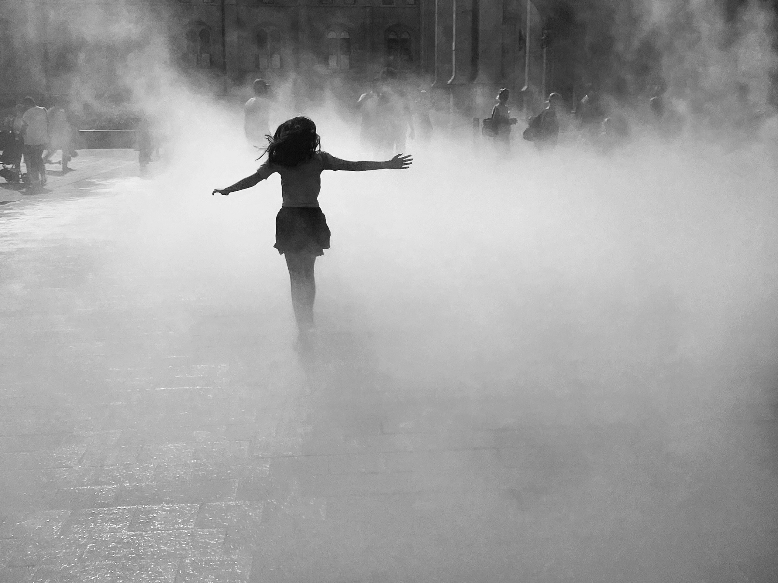 Girl in the fountain. Budapest 2026. IPHONE 12 PRO