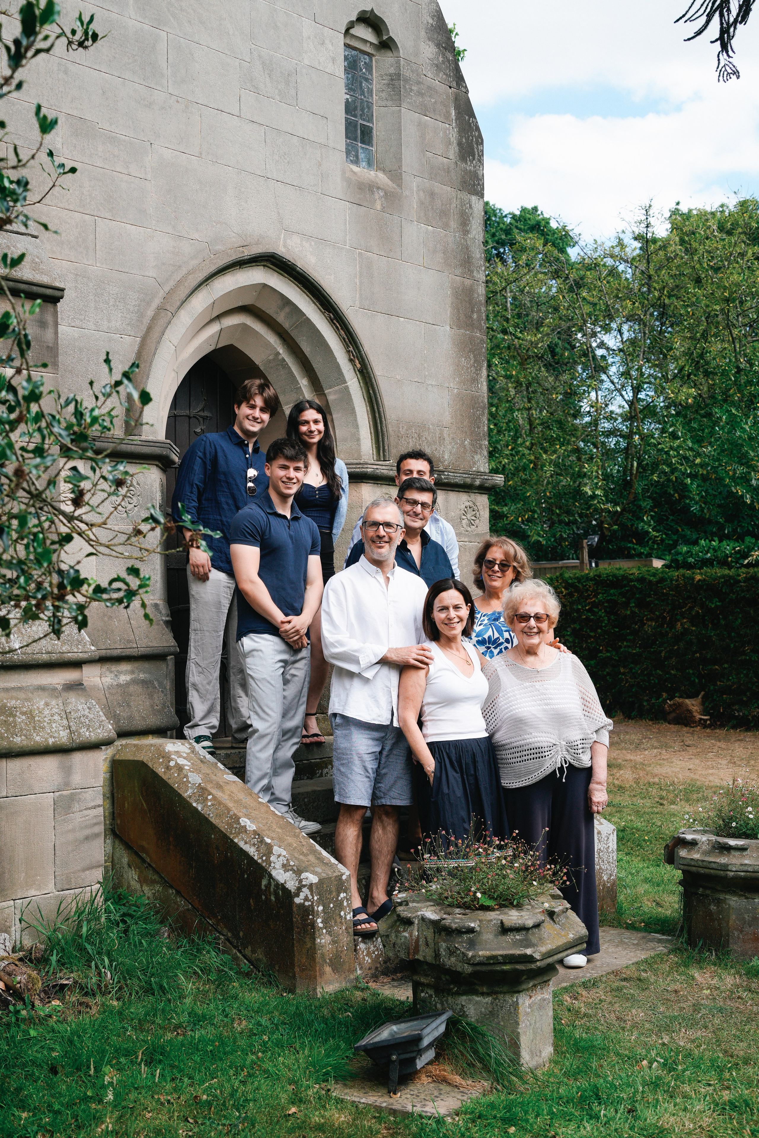 Family portrait outside for 90th birthday – three generations together.