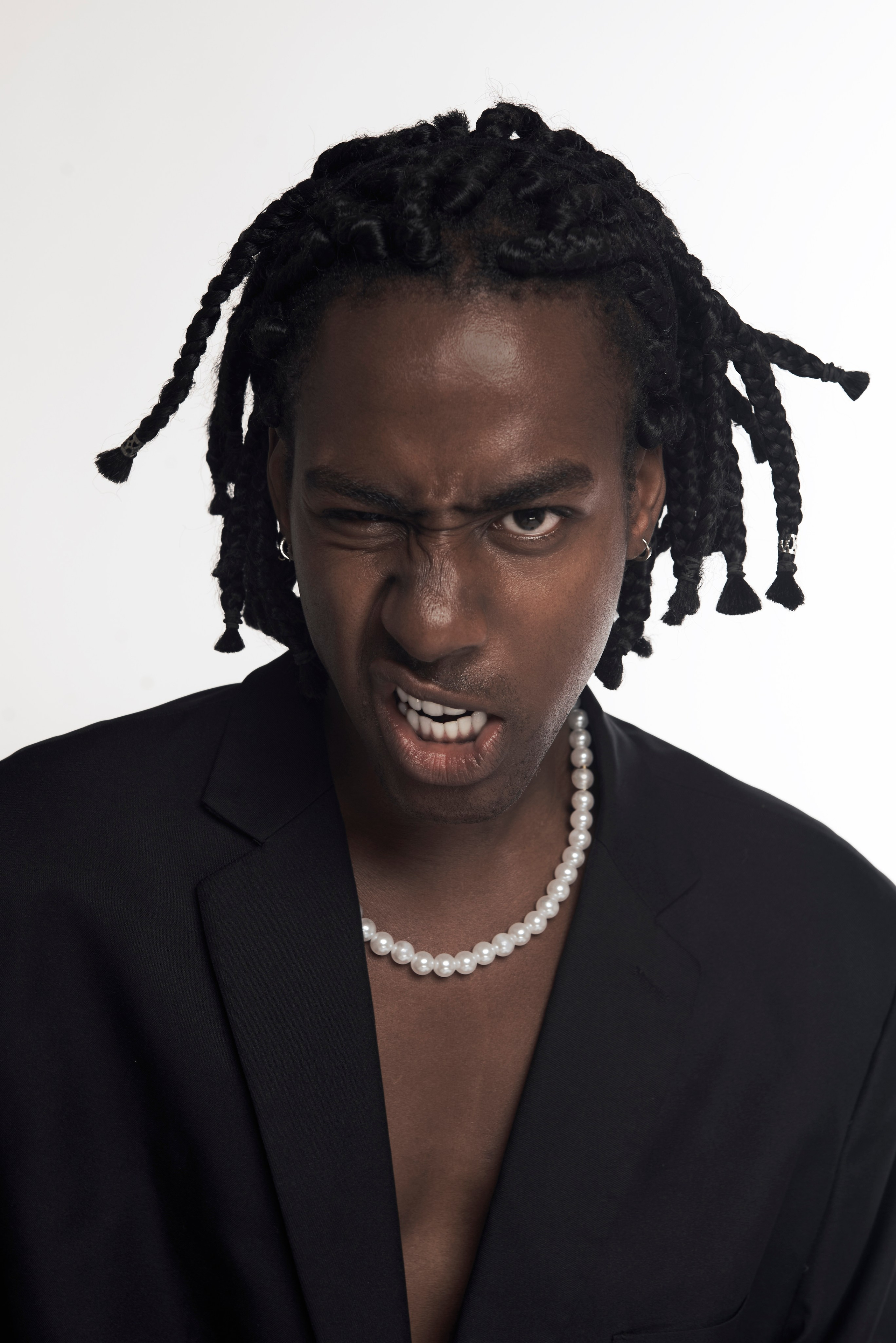 Studio portrait of a singer in Los Angeles with a playful expression