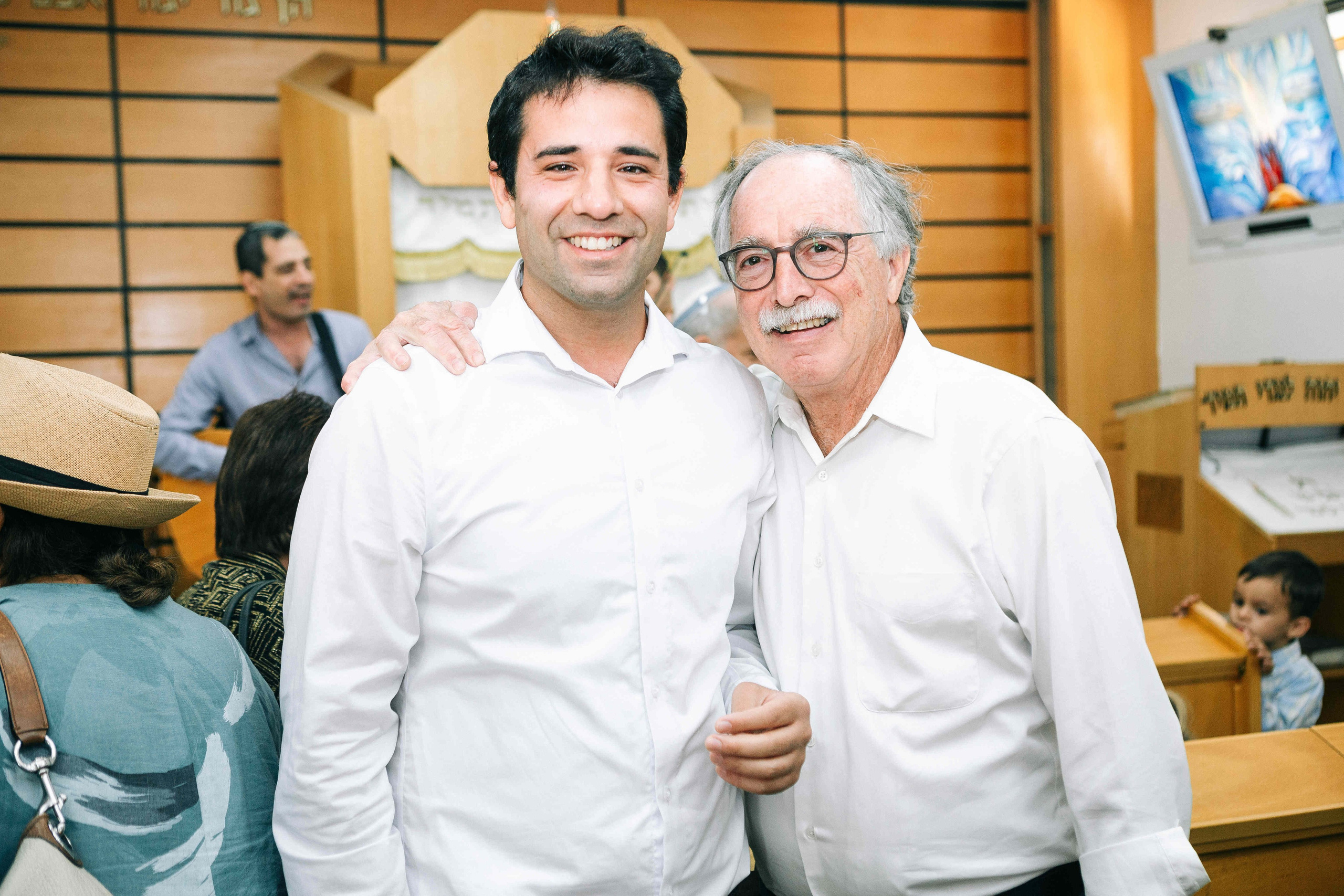 BRITH MILA IN THE SMALL SYNAGOGUE. PHOTOGRAPHER IN ISRAEL