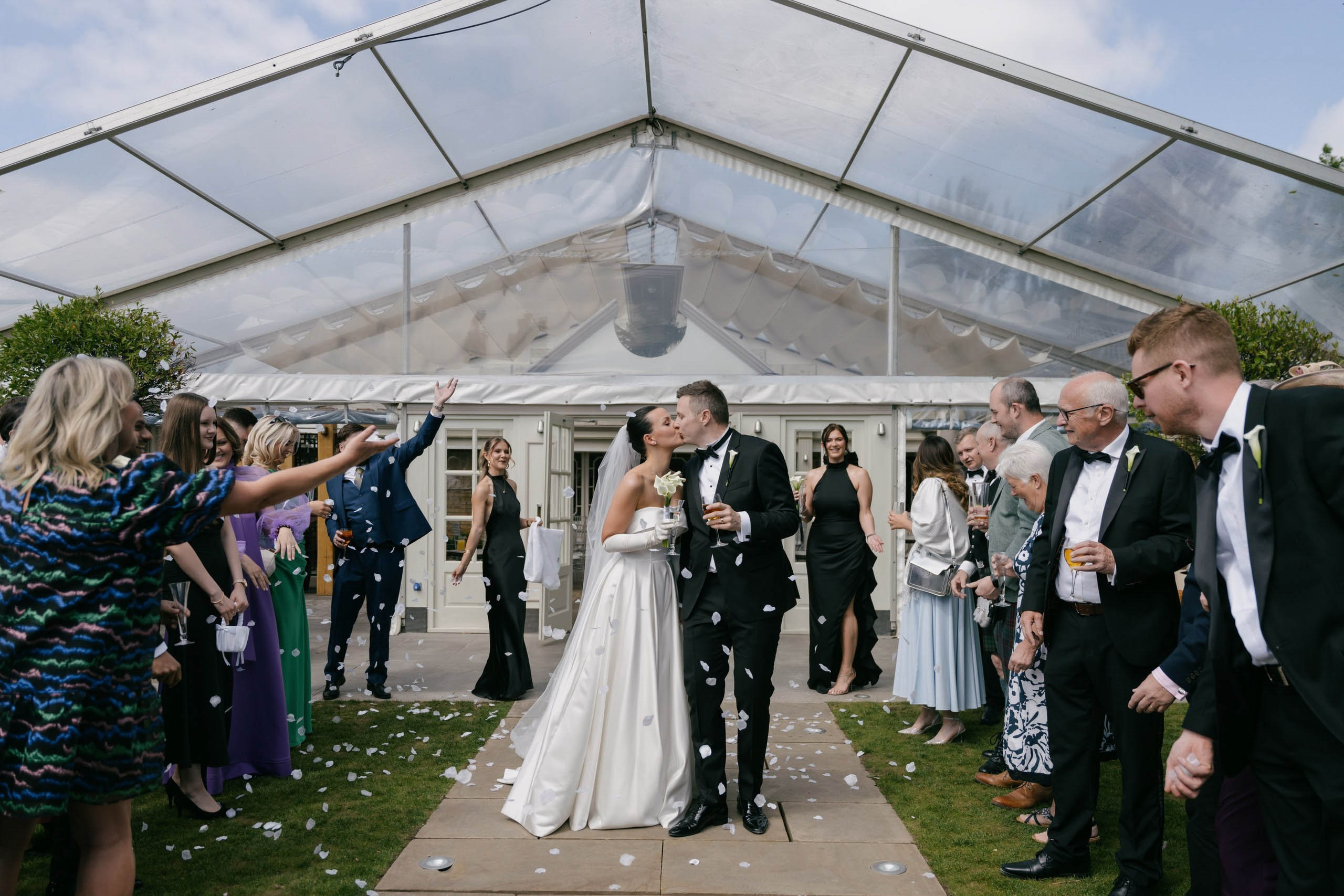 Bride and groom walking out of ceremony Friern Manor wedding Essex