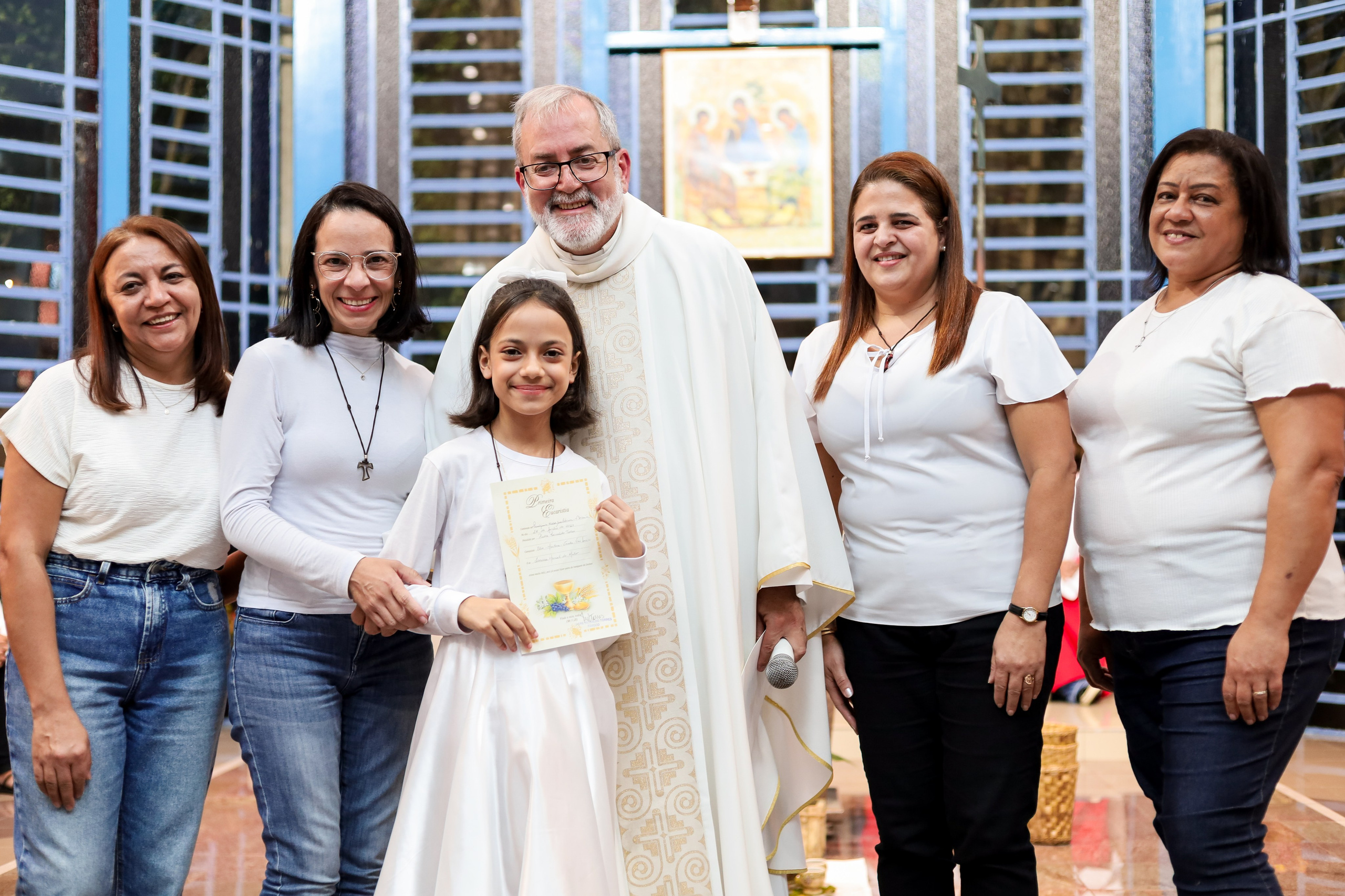 Primeira Eucaristia. Fotógrafo de momentos Sagrados