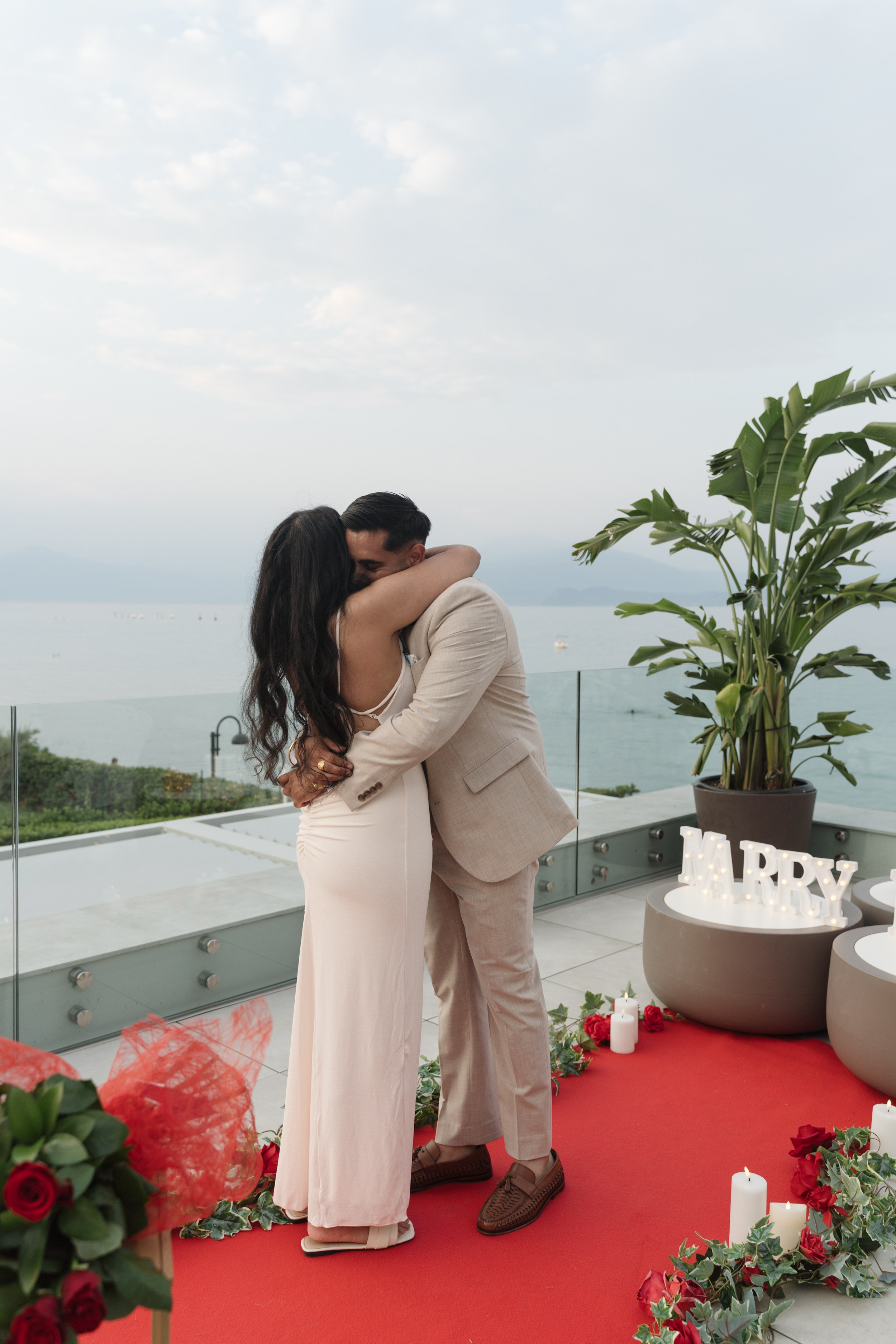 Lake Garda Rooftop Proposal. Lake Como Proposal Photographer | Surprise Proposals & Engagements
