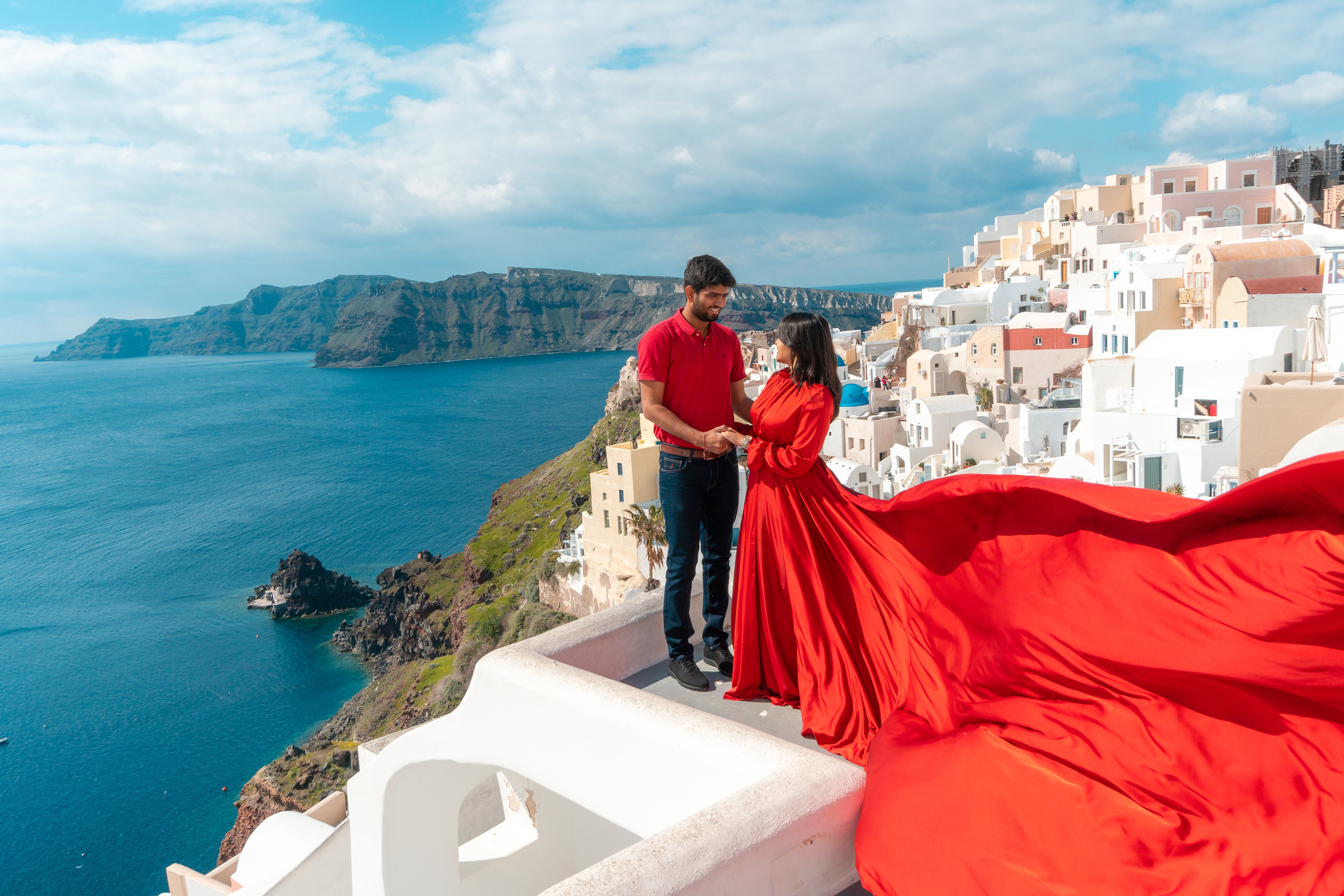 Red Long Sleeve Flying Dress Rent in Santorini. Photographer in Santorini SokoLOVE Alex| Flying Dress Santorini