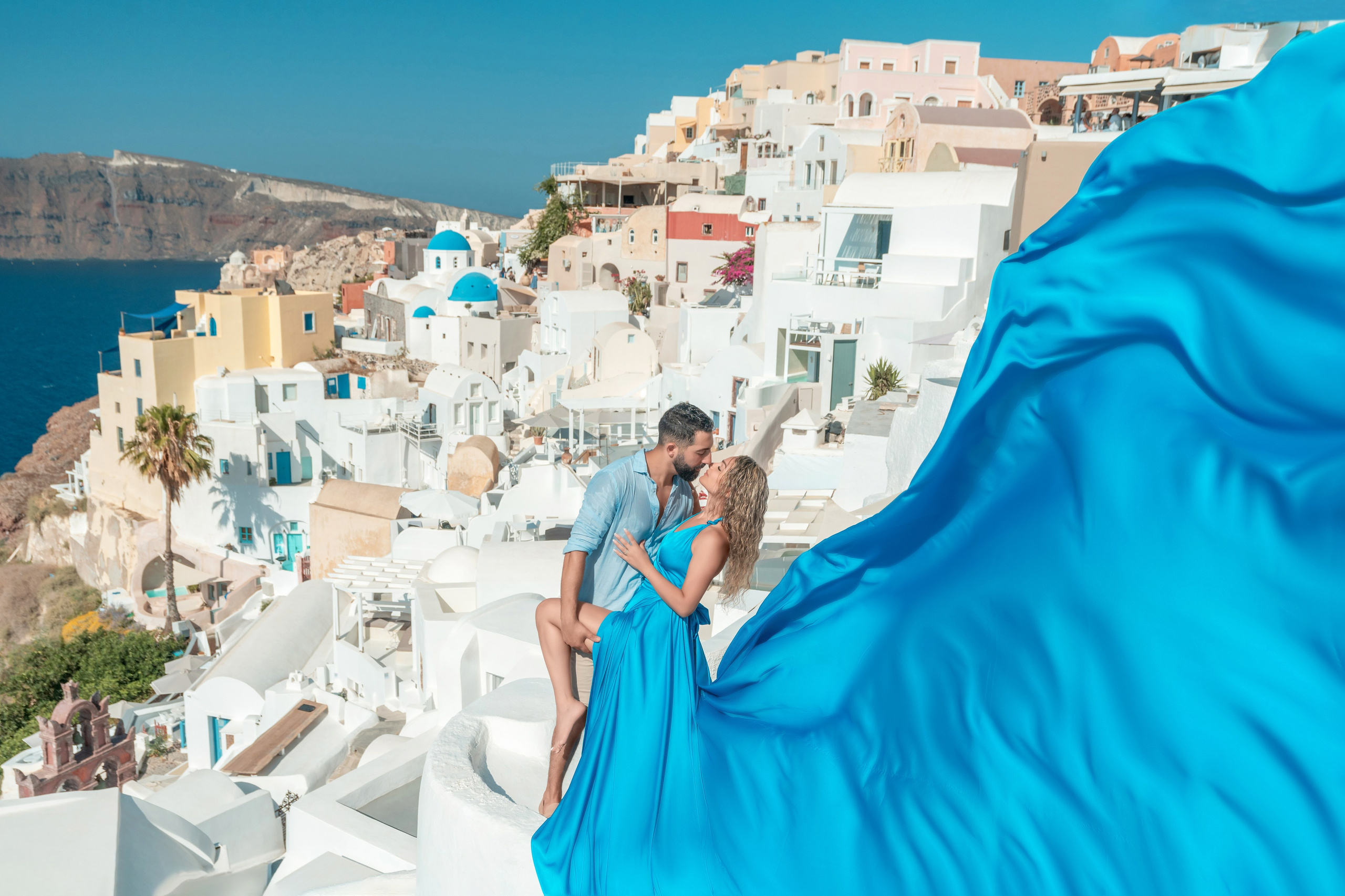 Sky Blue Flying DressBackless | Santorini-Inspired Elegance. Photographer in Santorini SokoLOVE Alex| Flying Dress Santorini