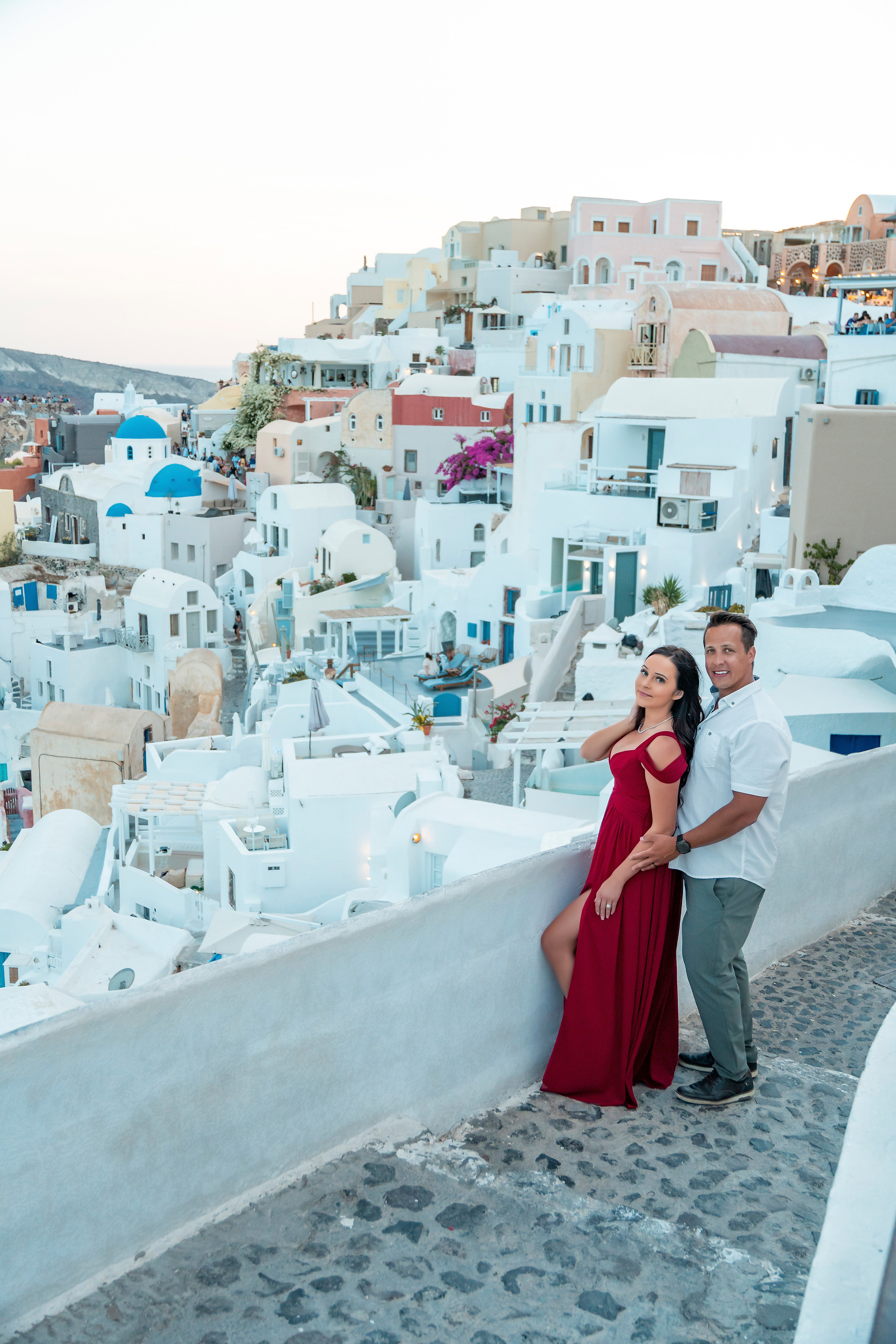 Couple photo session in Santorini, Oia. Photographer in Santorini SokoLOVE Alex| Flying Dress Santorini