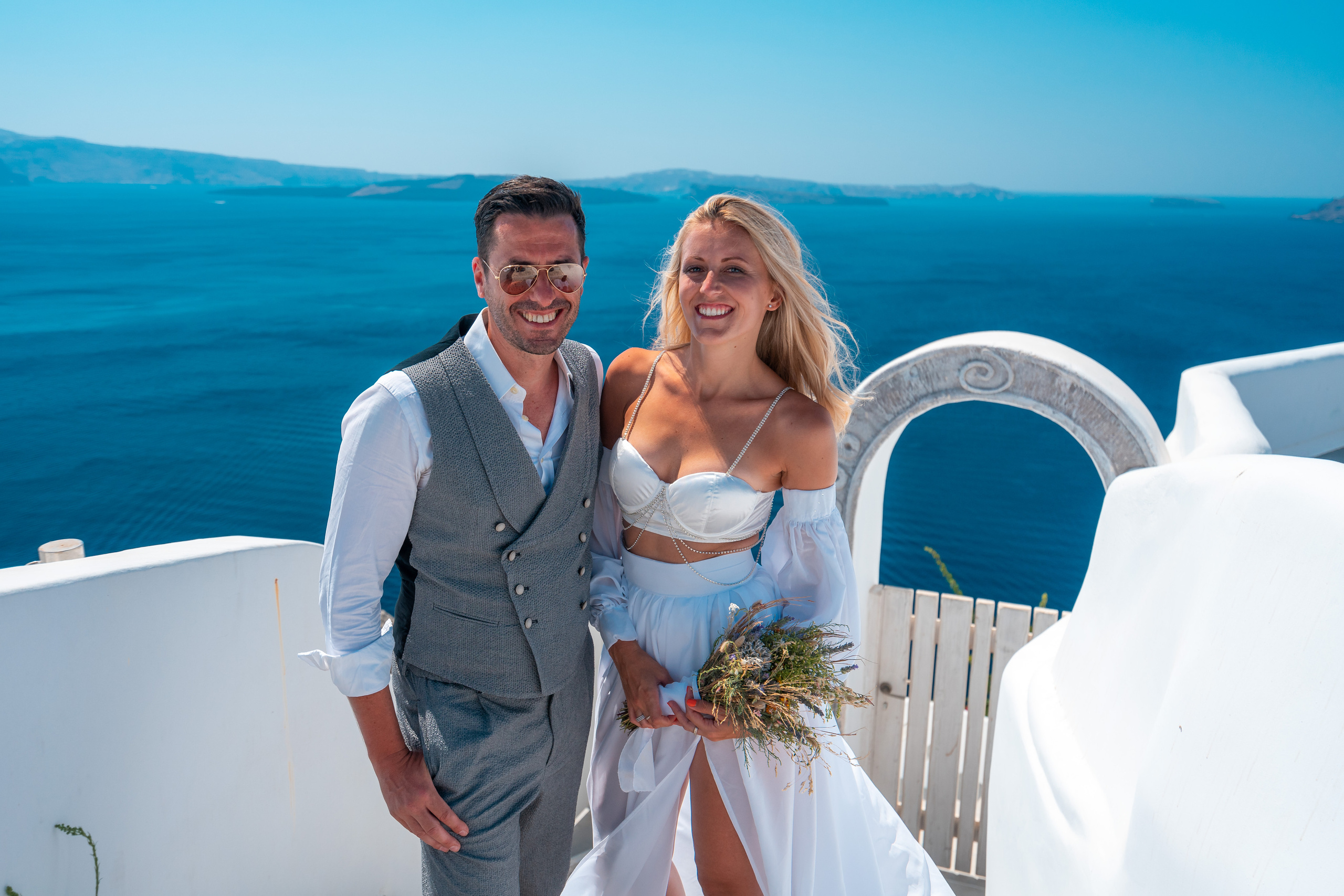 Wedding photographer in Santorini. Photographer in Santorini SokoLOVE Alex| Flying Dress Santorini
