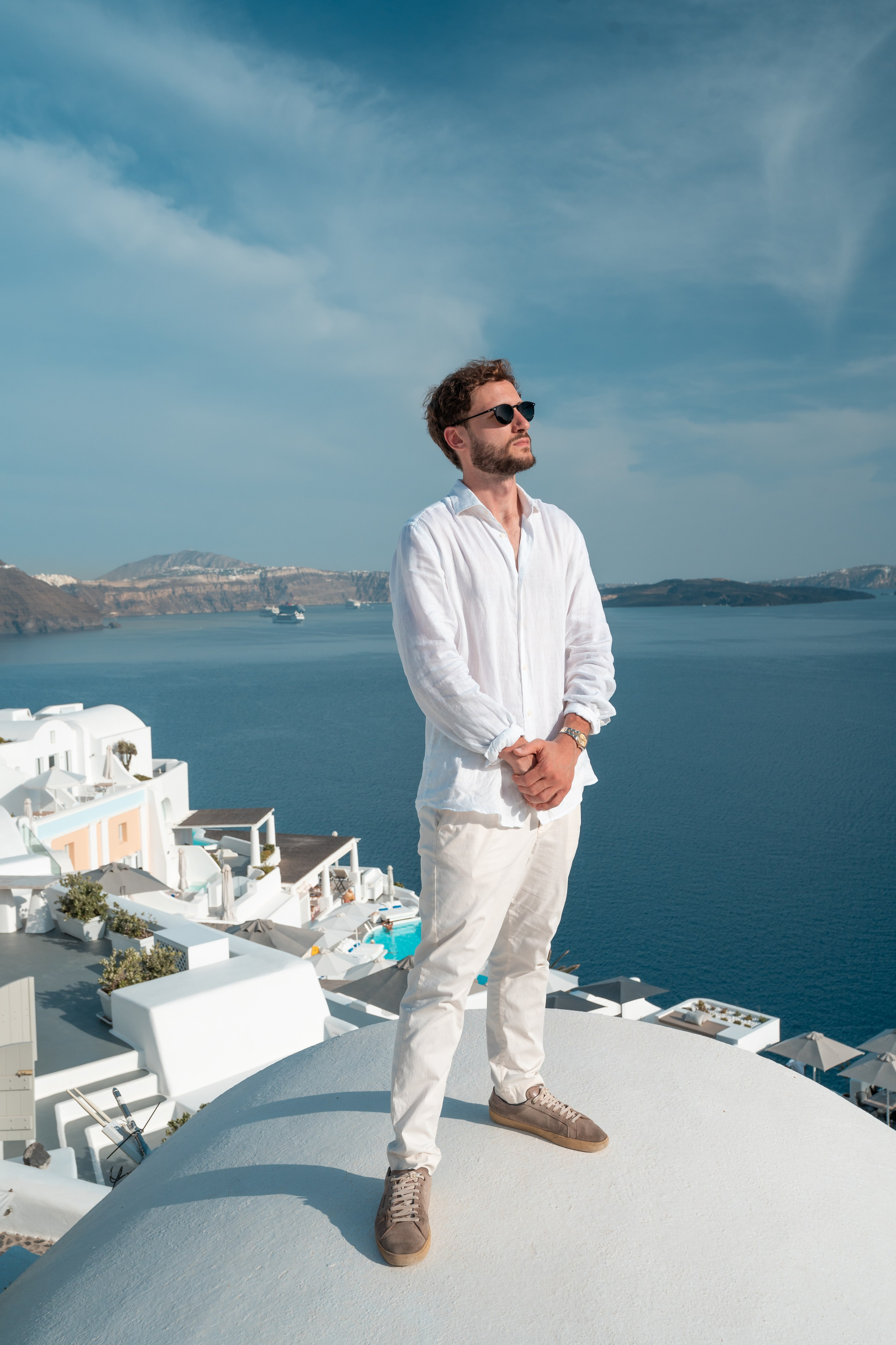 "Create unforgettable memories with a Santorini portrait photoshoot by Sokolove. Against the island's breathtaking backdrop, we'll capture your elegance, beauty, and the magic of paradise in every shot."