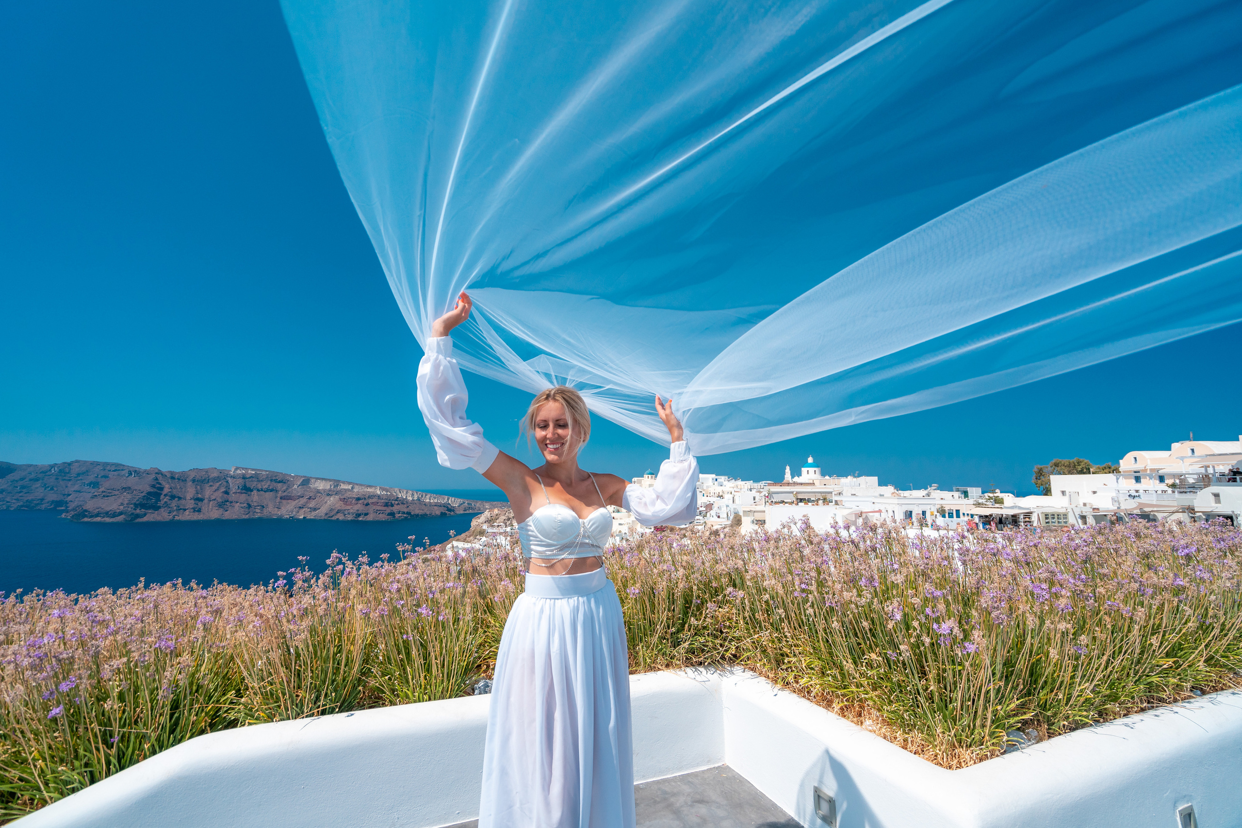 Wedding photographer in Santorini. Photographer in Santorini SokoLOVE Alex| Flying Dress Santorini