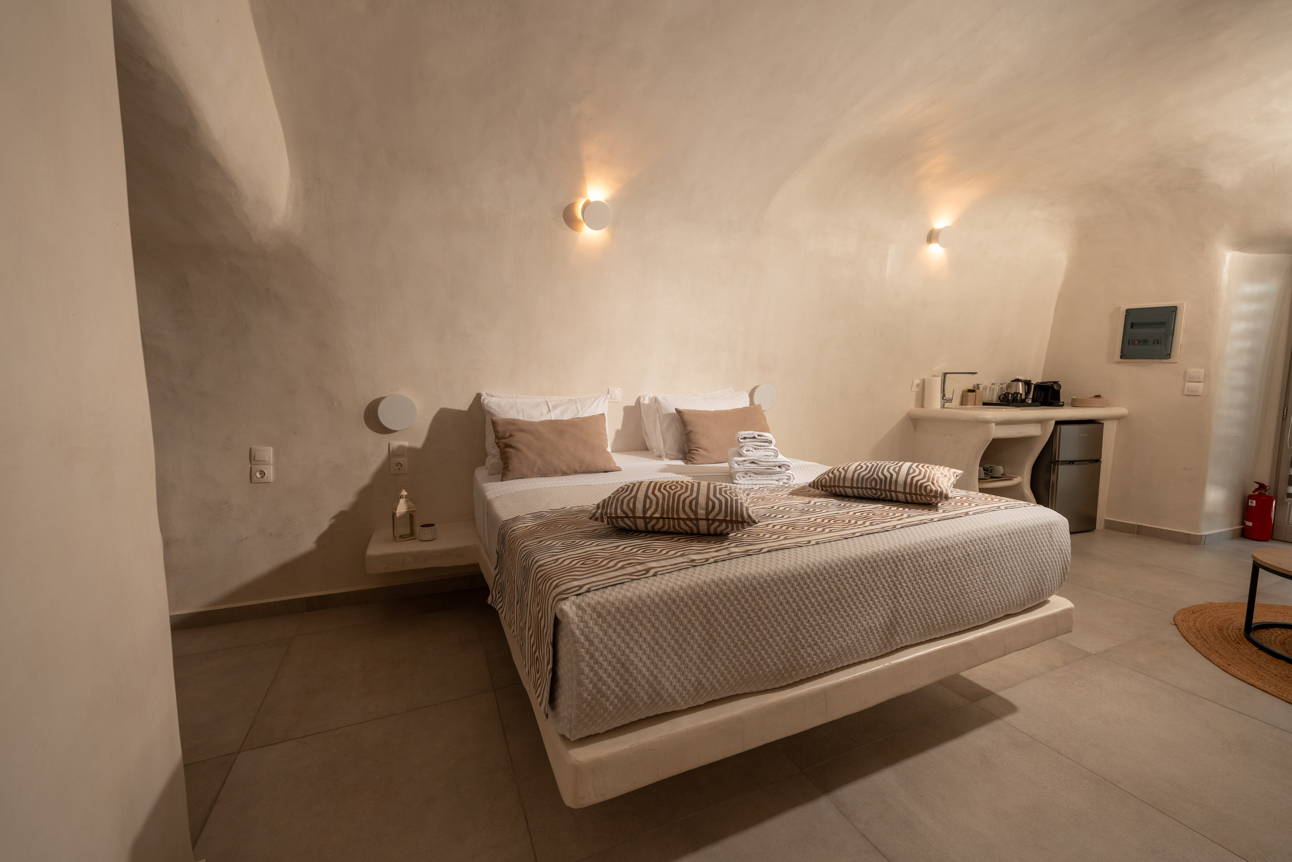 Hotel caves in Oia. Flying Dress Santorini Photographer | SokoLOVE — Book 2026
