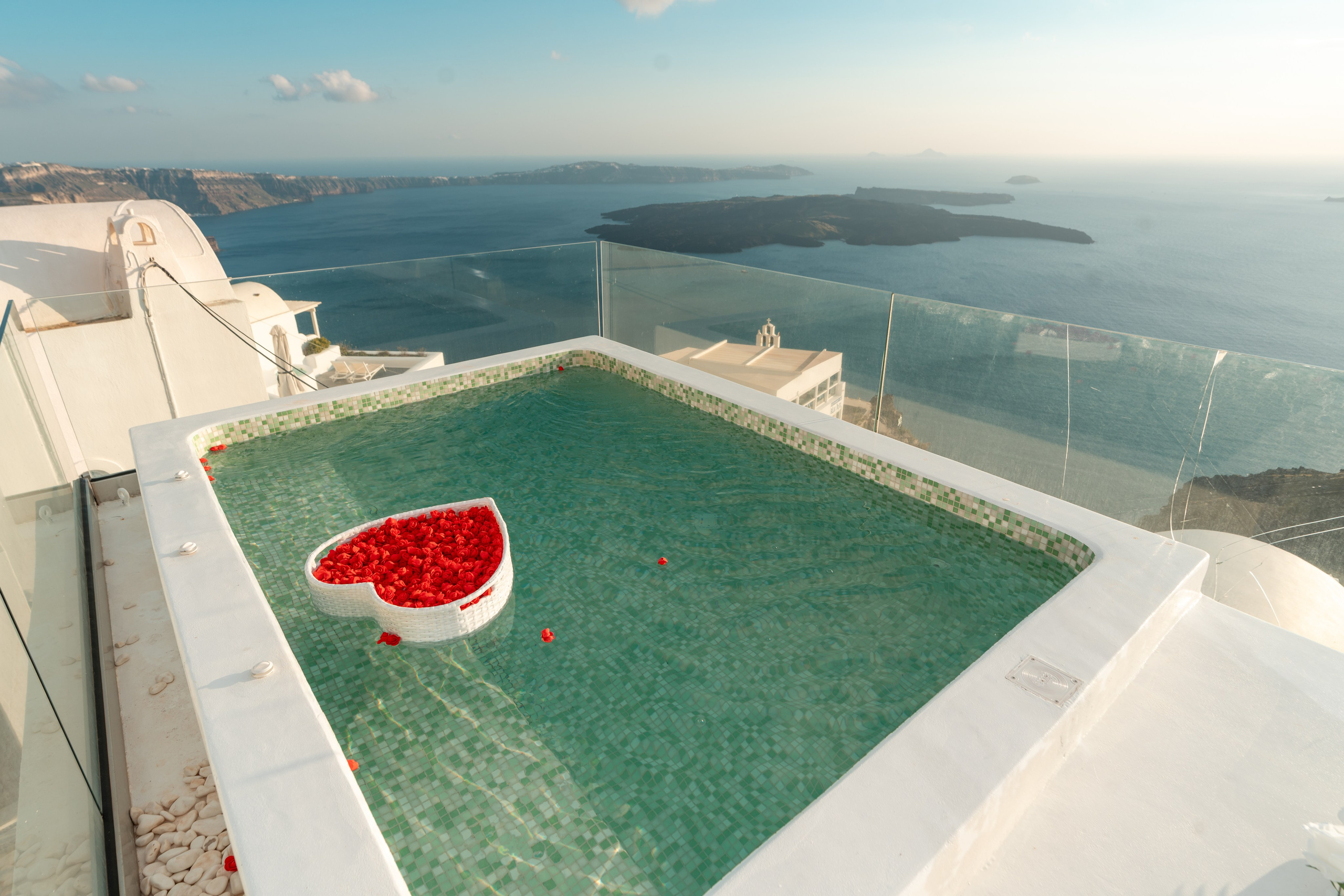 Here are SEO-optimized title and description options for a hotel focused on wedding events and proposals in Imerovigli, Santorini. Flying Dress Santorini Photographer | SokoLOVE — Book 2026