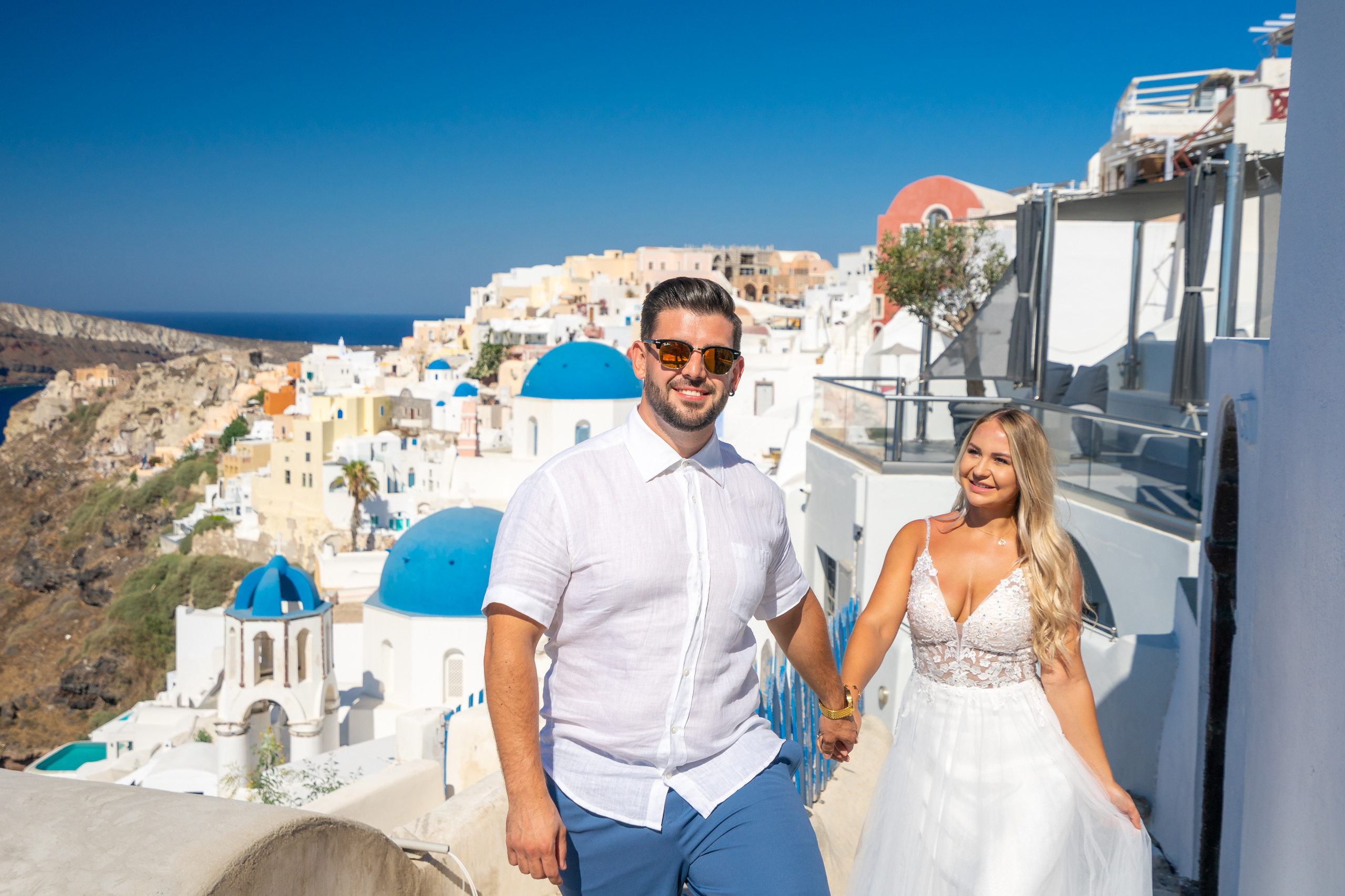 Wedding photographer in Santorini. Photographer in Santorini SokoLOVE Alex| Flying Dress Santorini