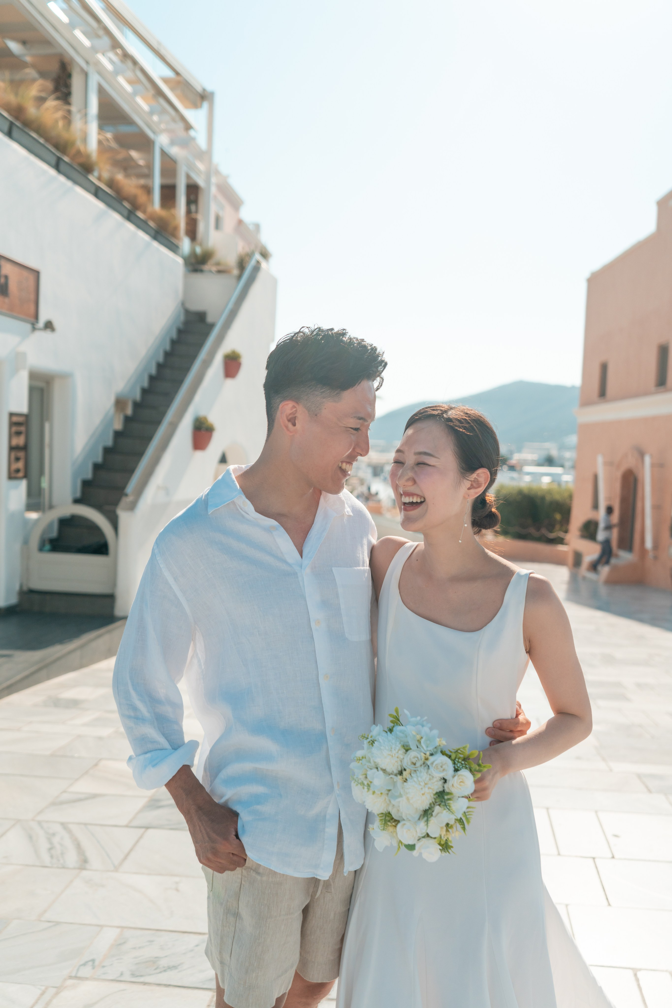 What is your love story in Santorini?. Photographe vidéaste à Santorin|Séances photos de Robe volante Santorin|