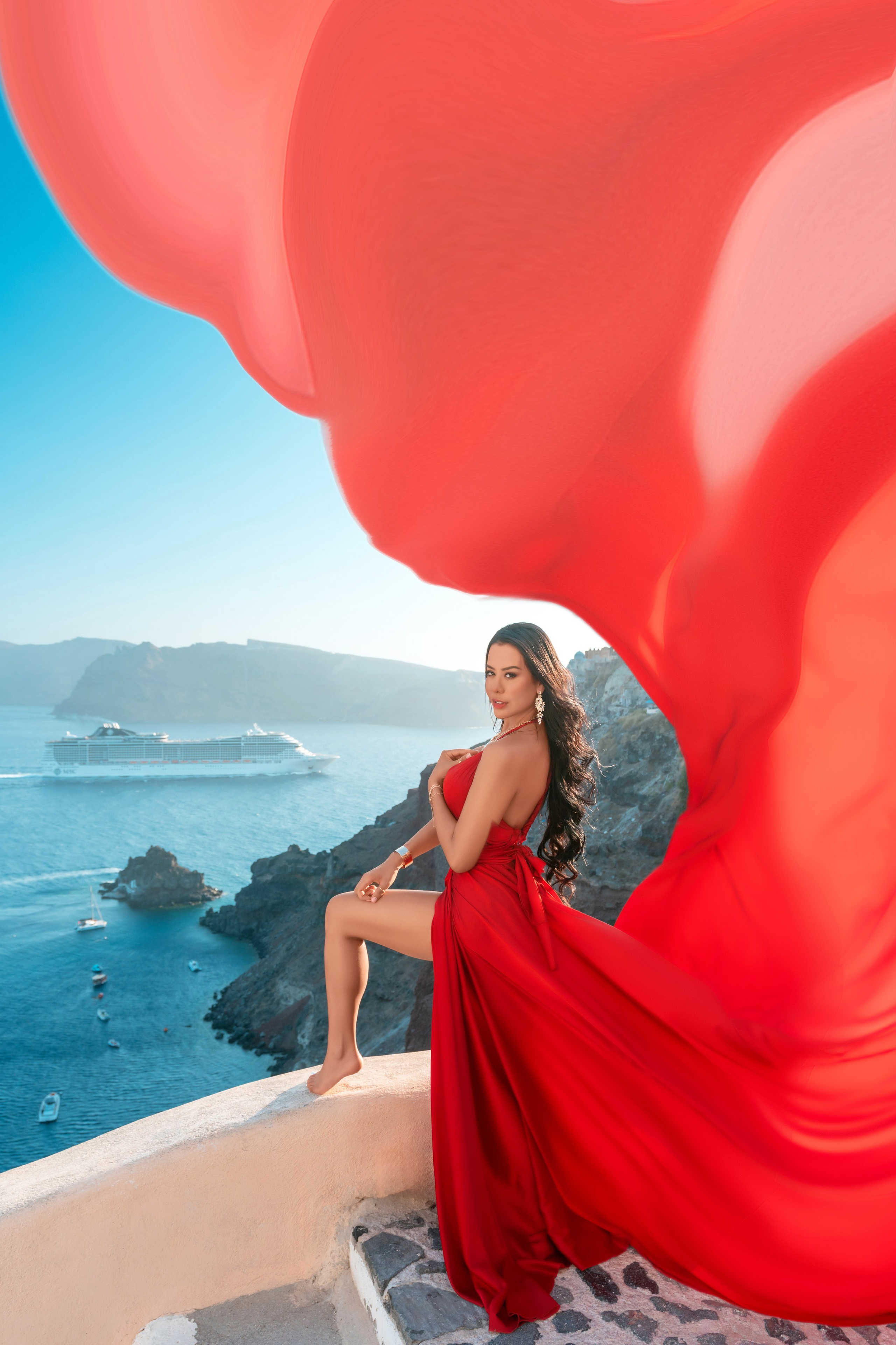 flying dress photoshoot Santorini cliff view