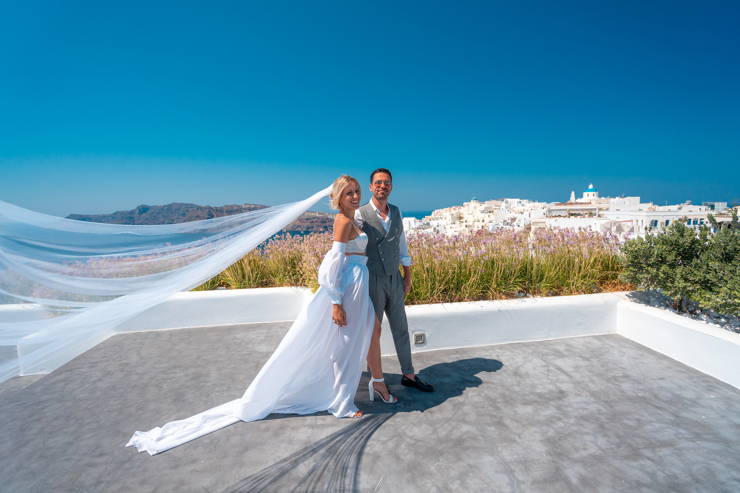 Wedding photographer in Santorini. Photographer in Santorini SokoLOVE Alex| Flying Dress Santorini