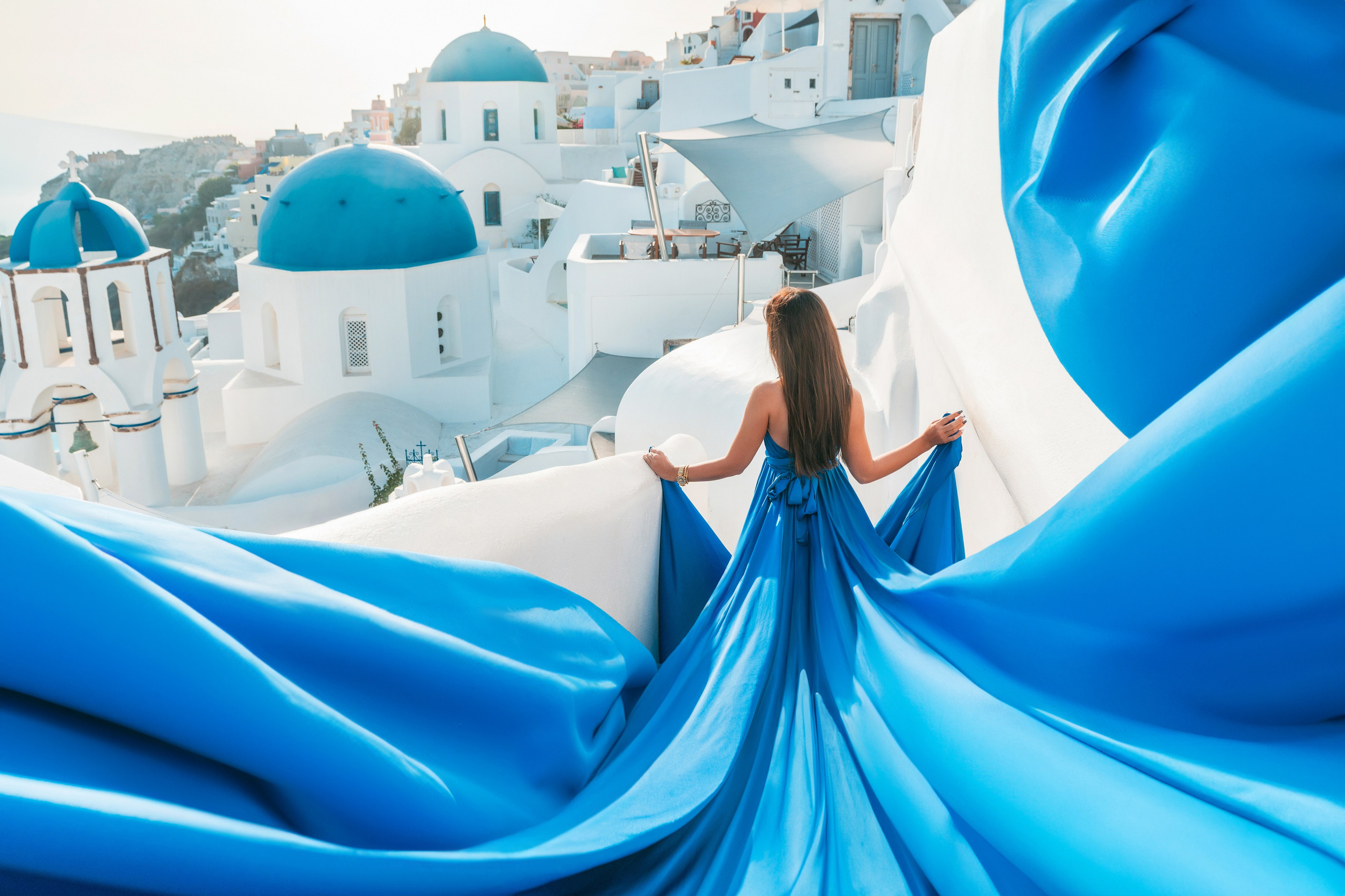 Sunset time in Oia, Santorini. Photographer in Santorini SokoLOVE Alex| Flying Dress Santorini