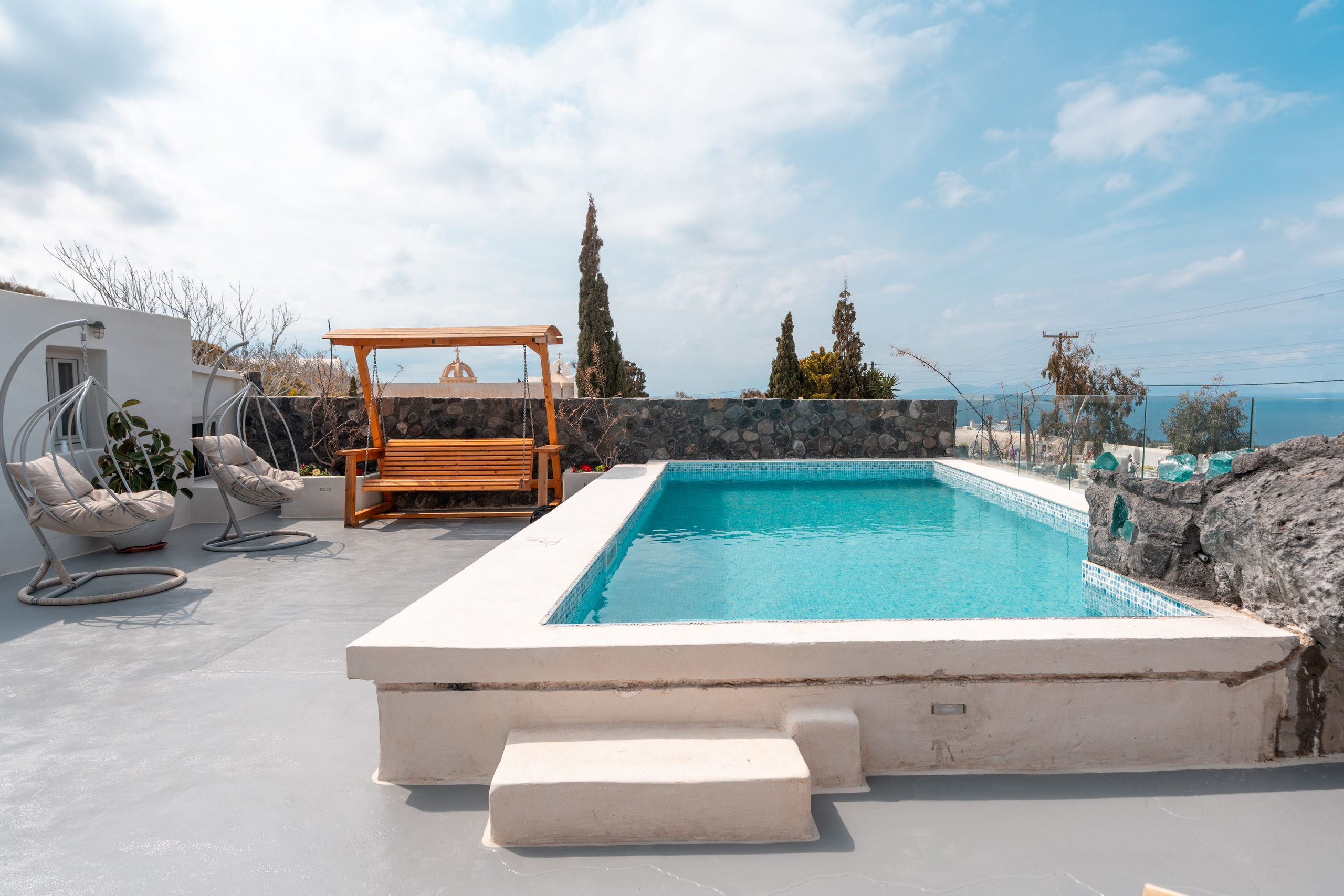 Hotel caves in Oia. Flying Dress Santorini Photographer | SokoLOVE — Book 2026