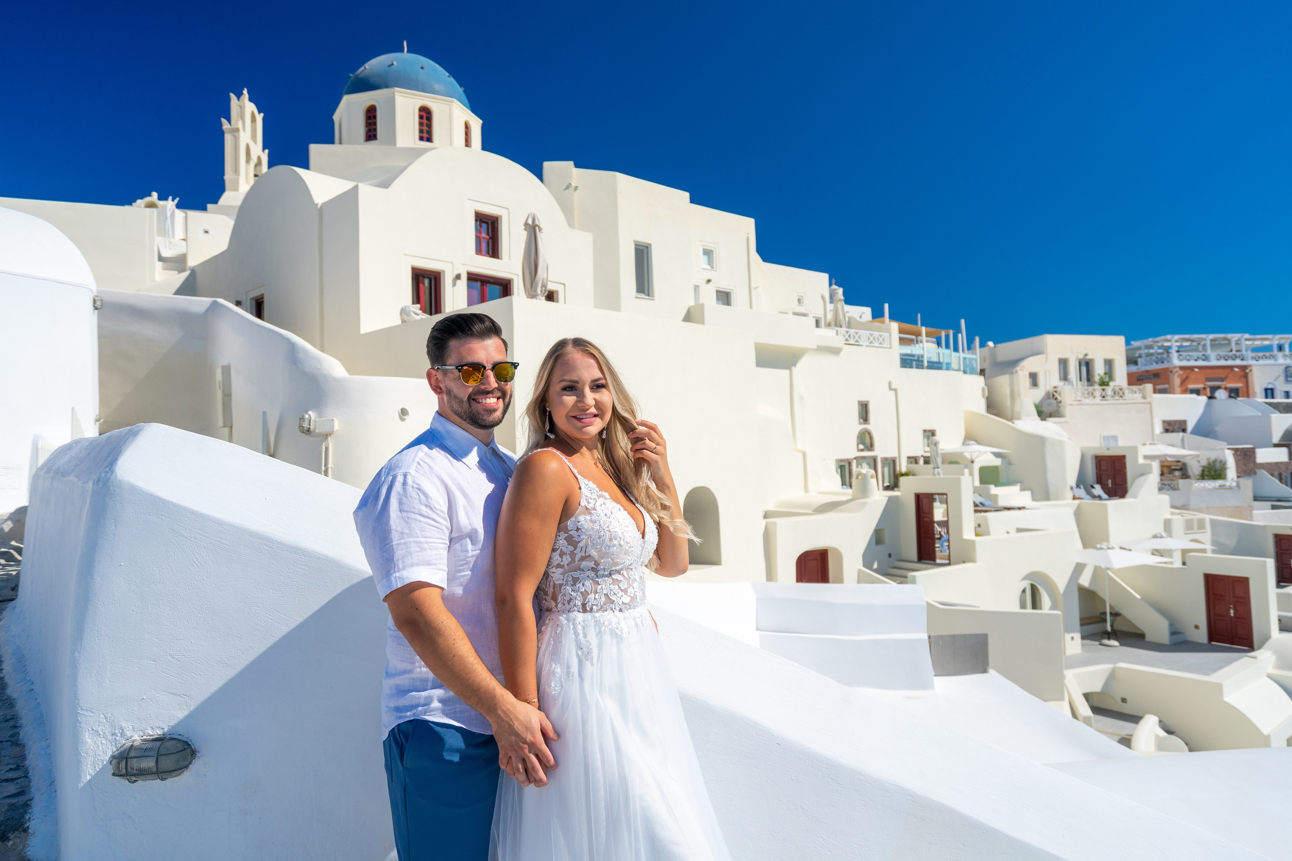 Wedding photographer in Santorini. Photographer in Santorini SokoLOVE Alex| Flying Dress Santorini