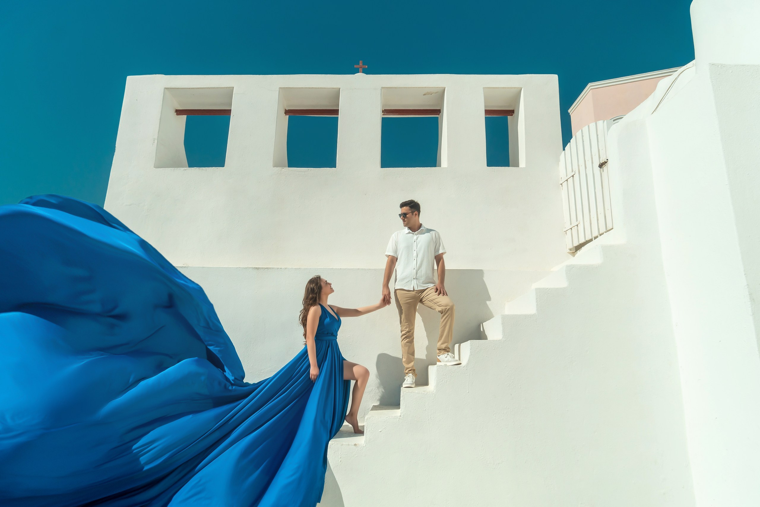 Romantic Marriage Proposal in Oia, Santorini | Wedding Photographer Greece. Photographer in Santorini SokoLOVE Alex| Flying Dress Santorini