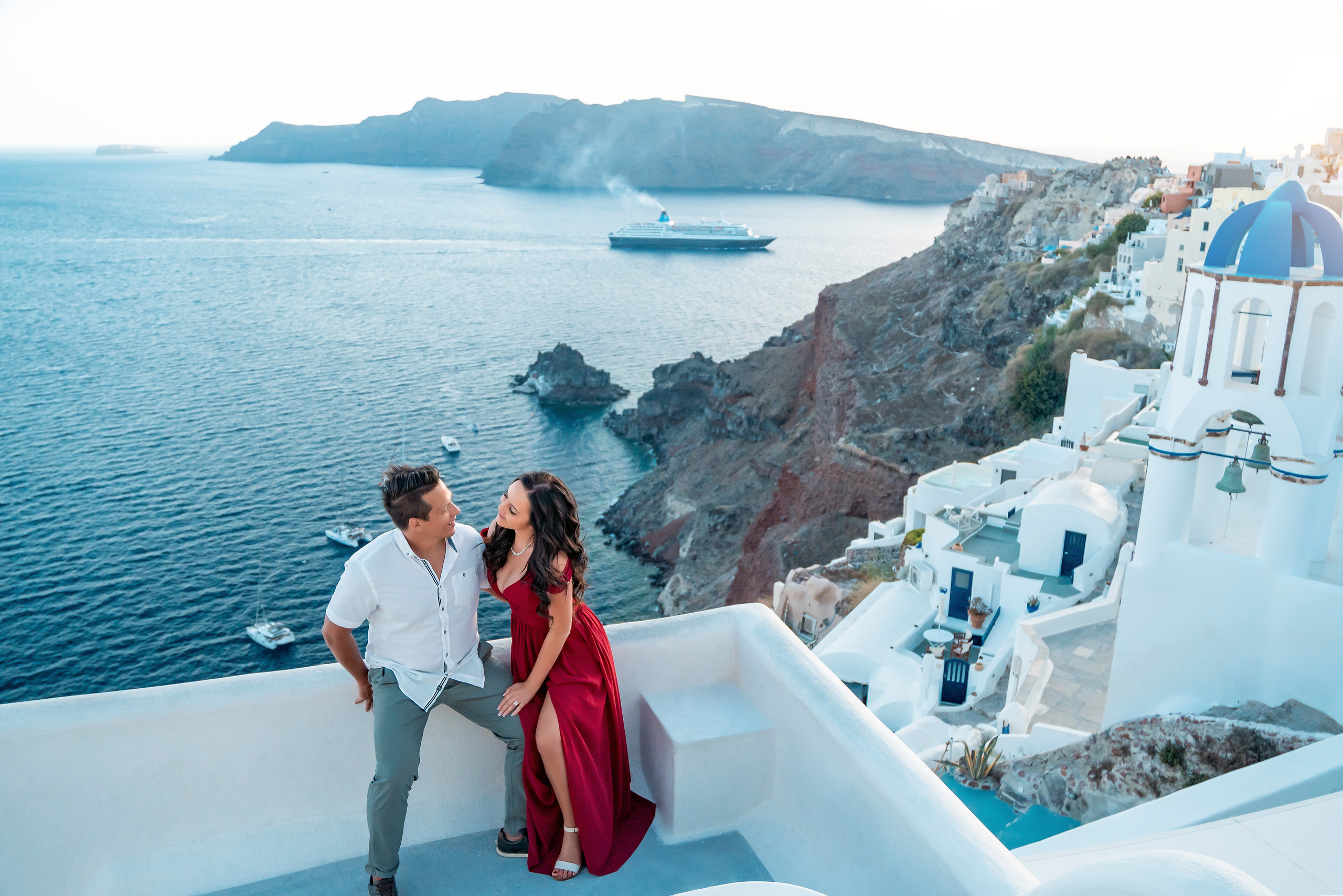 Couple photo session in Santorini, Oia. Photographer in Santorini SokoLOVE Alex| Flying Dress Santorini