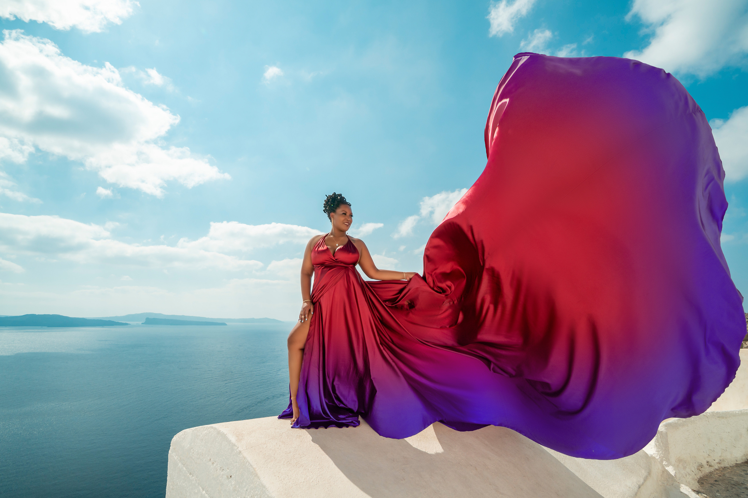 Elegant Plus Size Red Wine Satin Flying Dress for Rent in Santorini (Sizes L-XXXL)"Rent a gorgeous plus size red wine satin flying dress with a V-shaped back for your Santorini photoshoot. Available in L-XXXL, this flowing gown will make you feel like royalty against the stunning backdrop of Santorini. Book today and experience the magic of a photoshoot in Greece!"