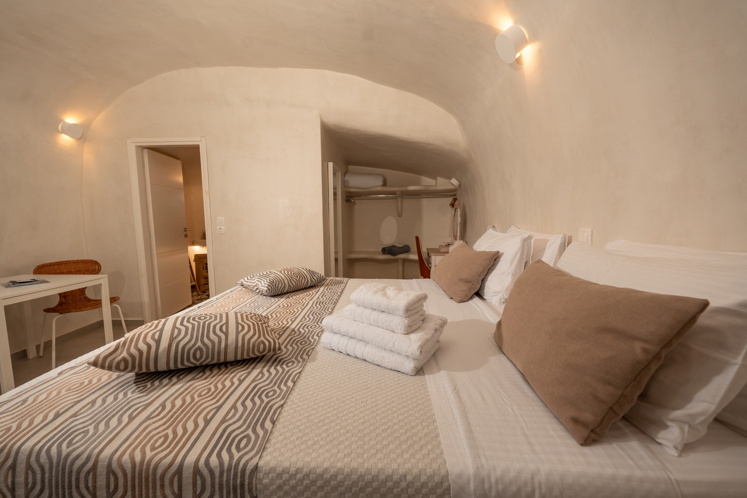 Hotel caves in Oia. Flying Dress Santorini Photographer | SokoLOVE — Book 2026