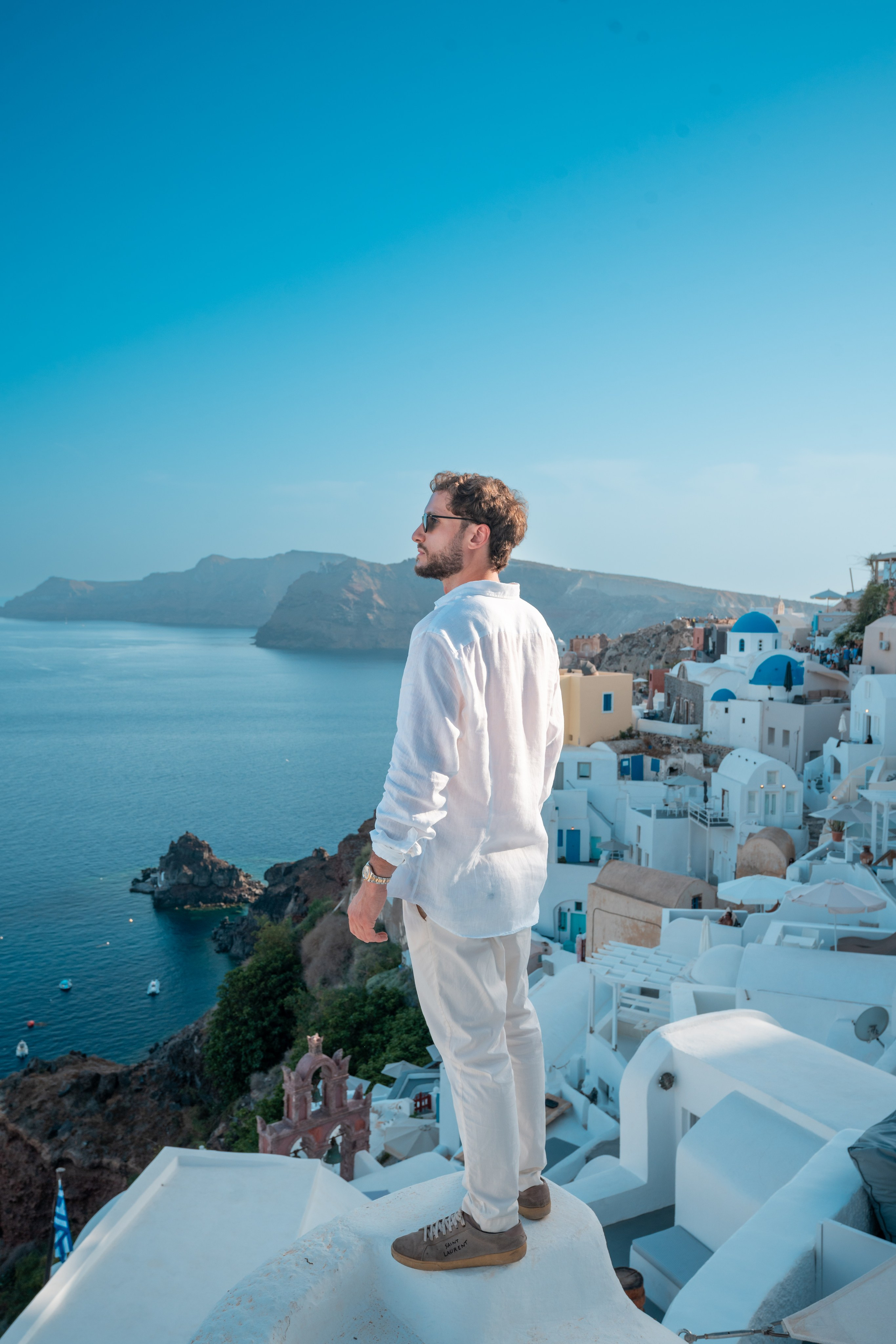 Immerse yourself in the stunning beauty of Santorini with a professional portrait photoshoot by Sokolove. Let us capture your elegance in this breathtaking paradise, creating timeless, powerful portraits that showcase your style.