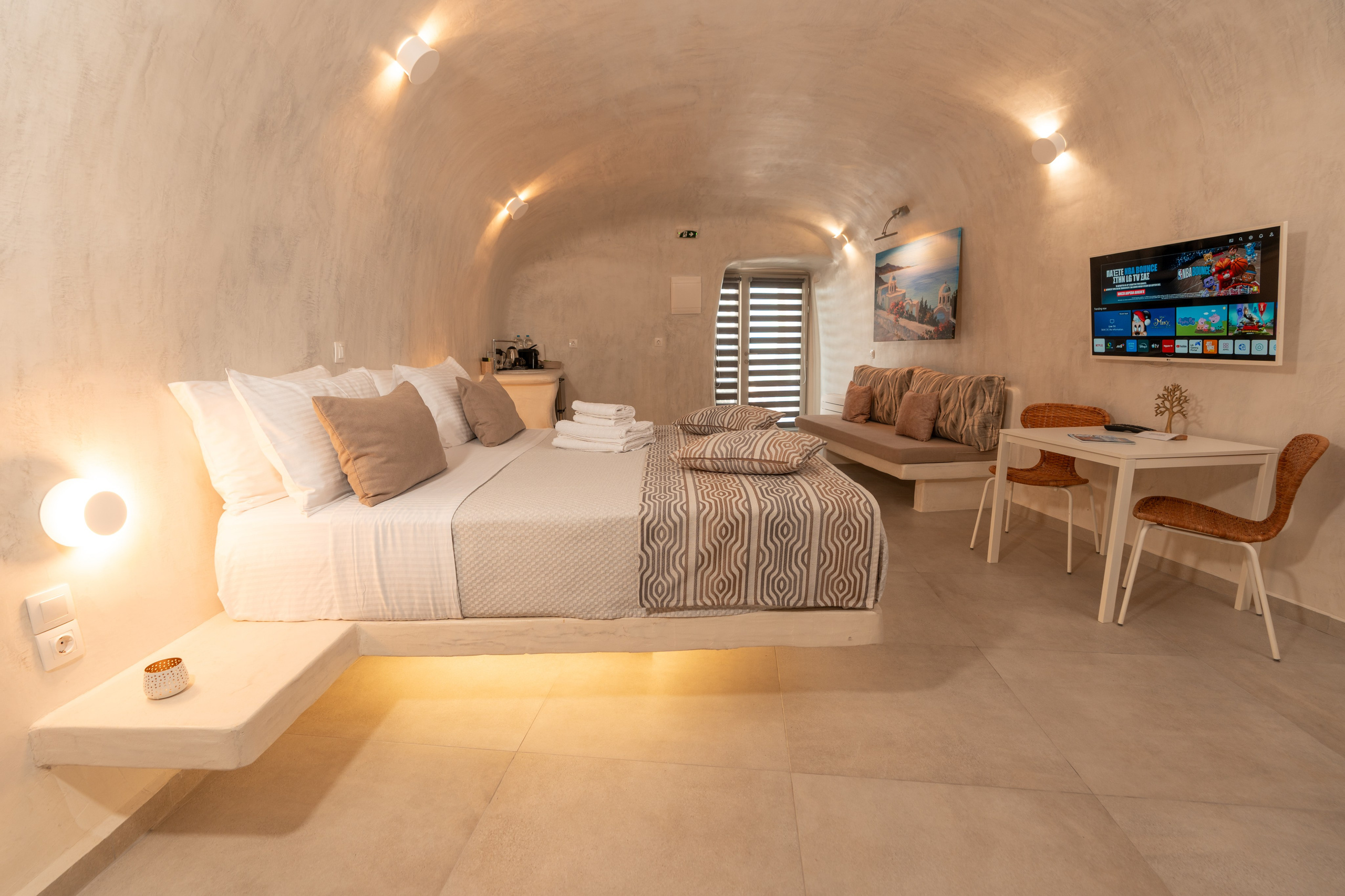 Hotel caves in Oia. Flying Dress Santorini Photographer | SokoLOVE — Book 2026