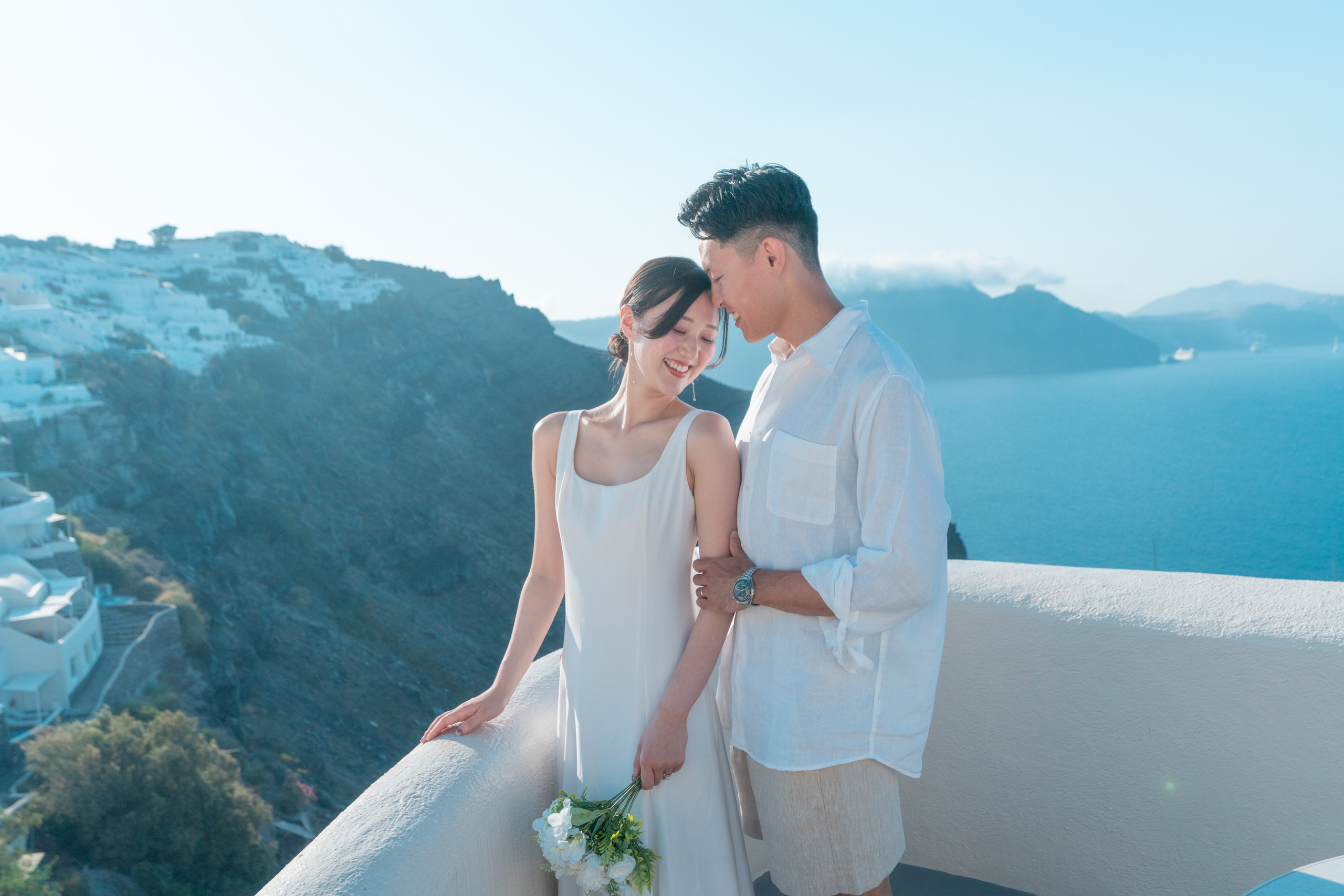 What is your love story in Santorini?. Photographe vidéaste à Santorin|Séances photos de Robe volante Santorin|