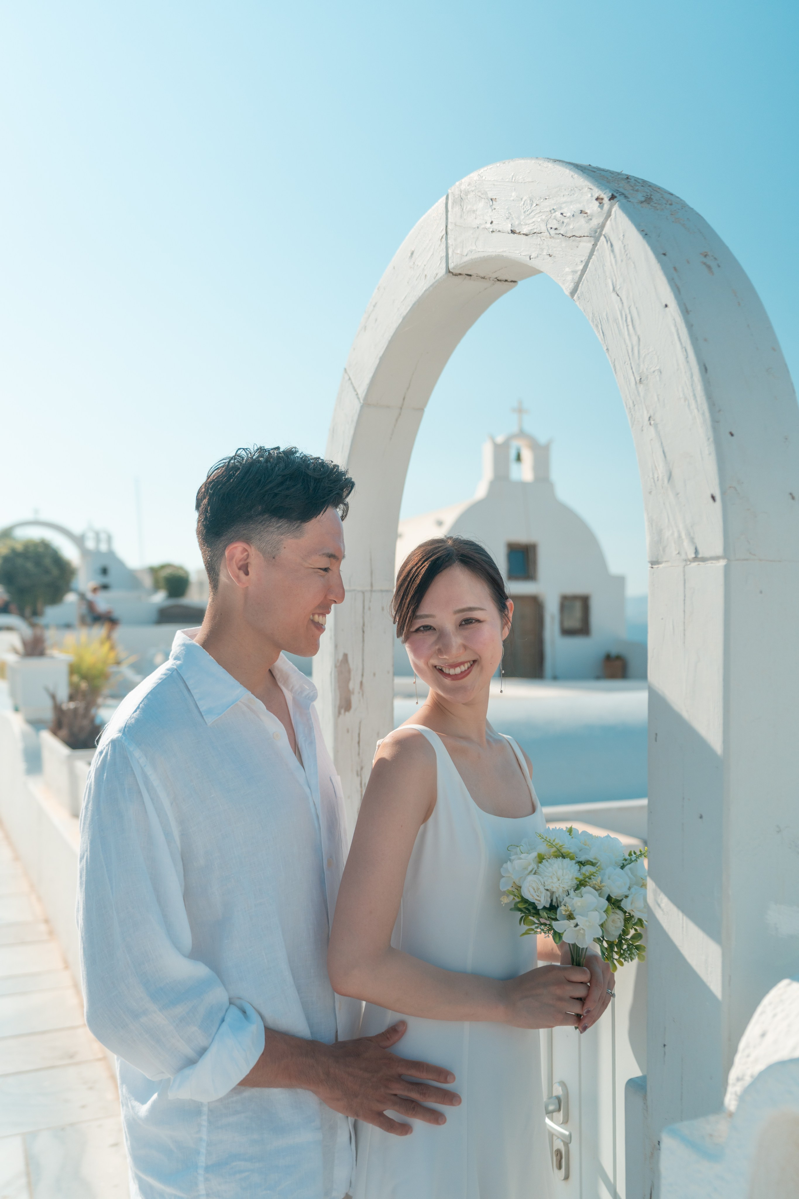 What is your love story in Santorini?. Photographe vidéaste à Santorin|Séances photos de Robe volante Santorin|