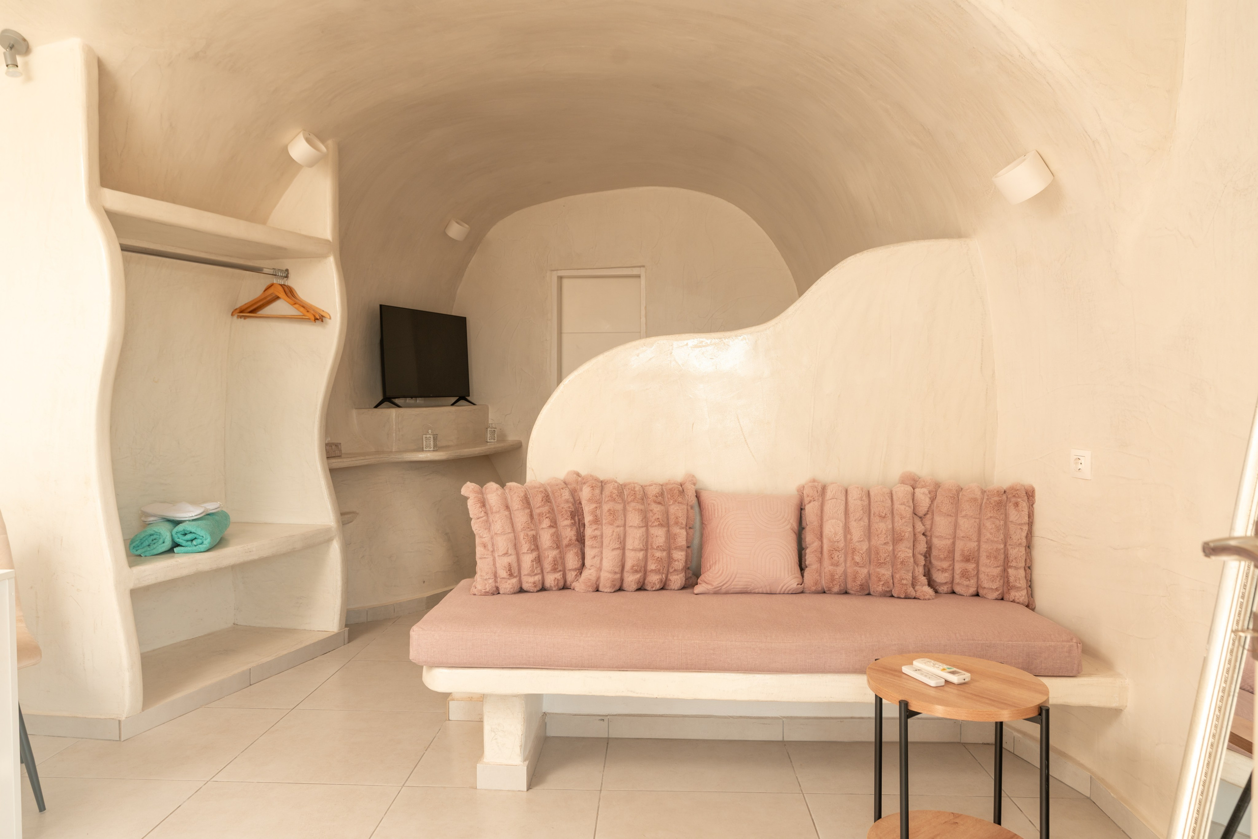 Hotel caves in Oia. Flying Dress Santorini Photographer | SokoLOVE — Book 2026