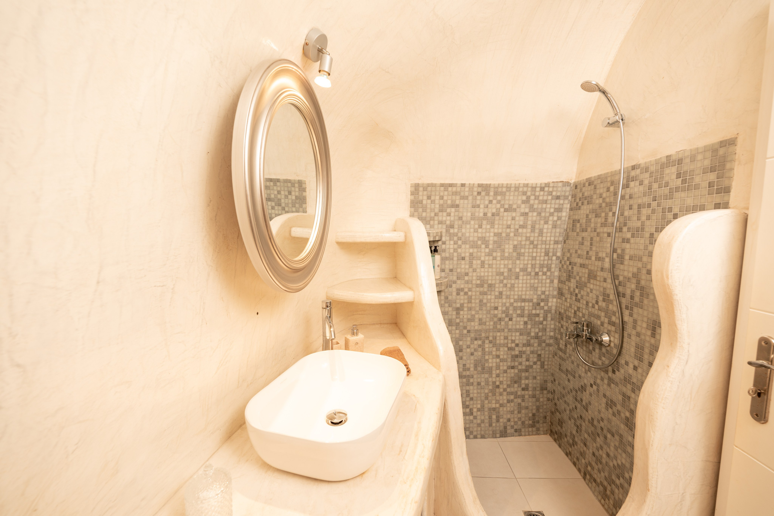 Hotel caves in Oia. Flying Dress Santorini Photographer | SokoLOVE — Book 2026