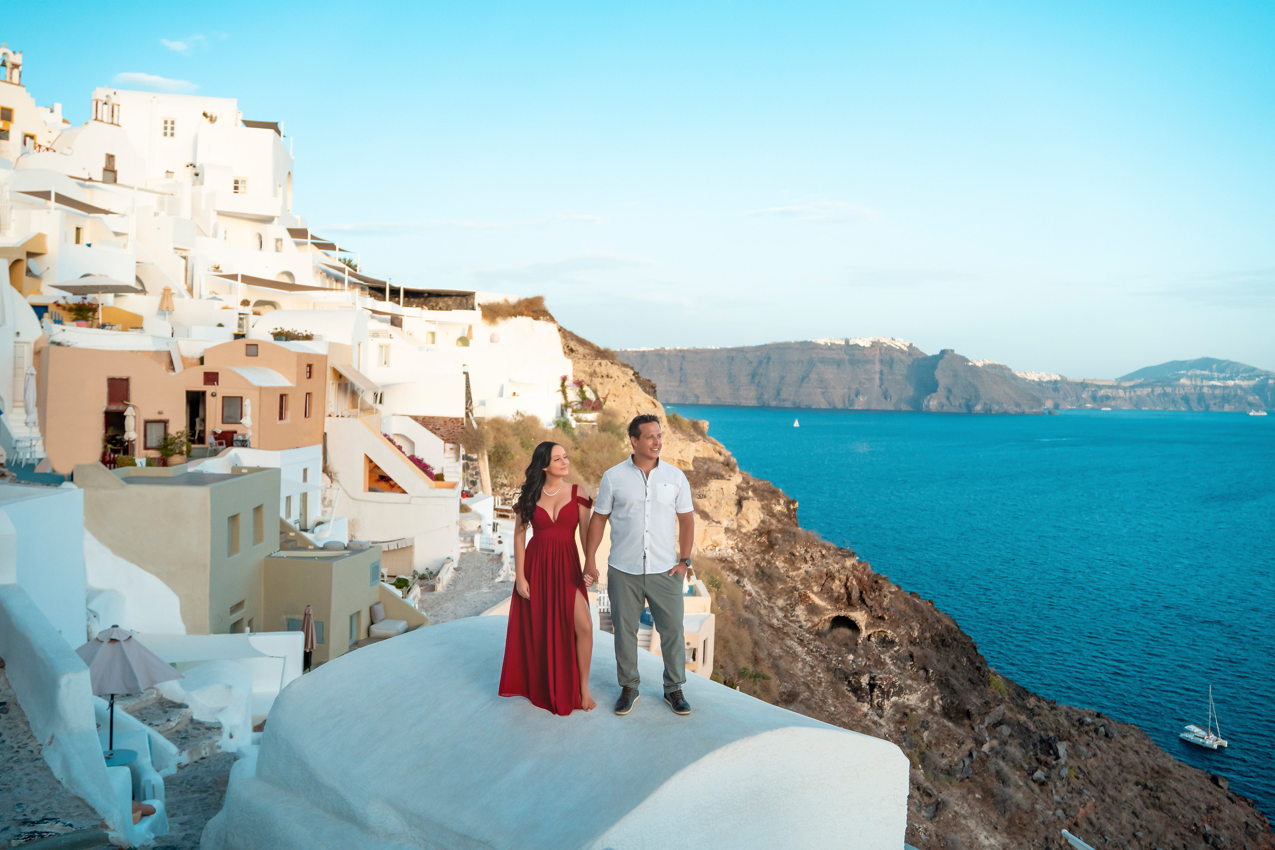 Couple photo session in Santorini, Oia. Photographer in Santorini SokoLOVE Alex| Flying Dress Santorini