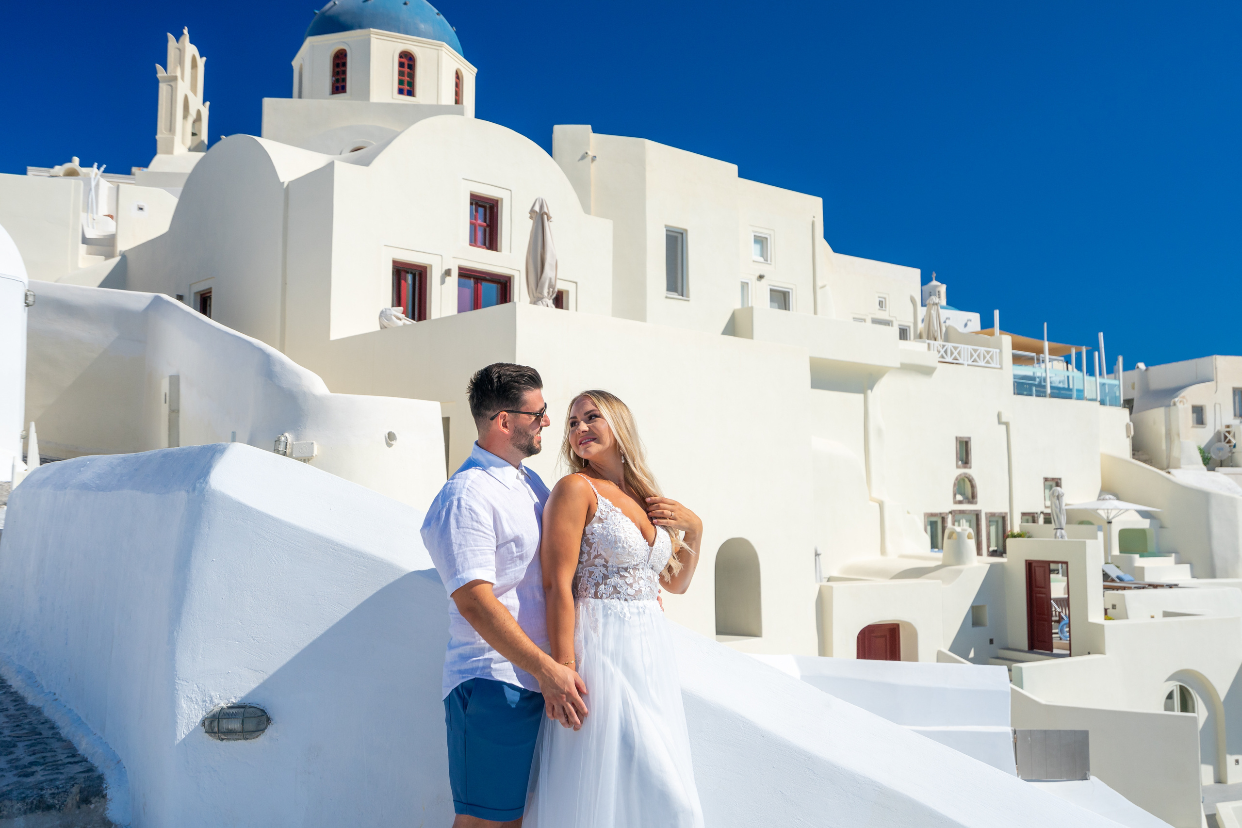 Wedding photographer in Santorini. Photographer in Santorini SokoLOVE Alex| Flying Dress Santorini