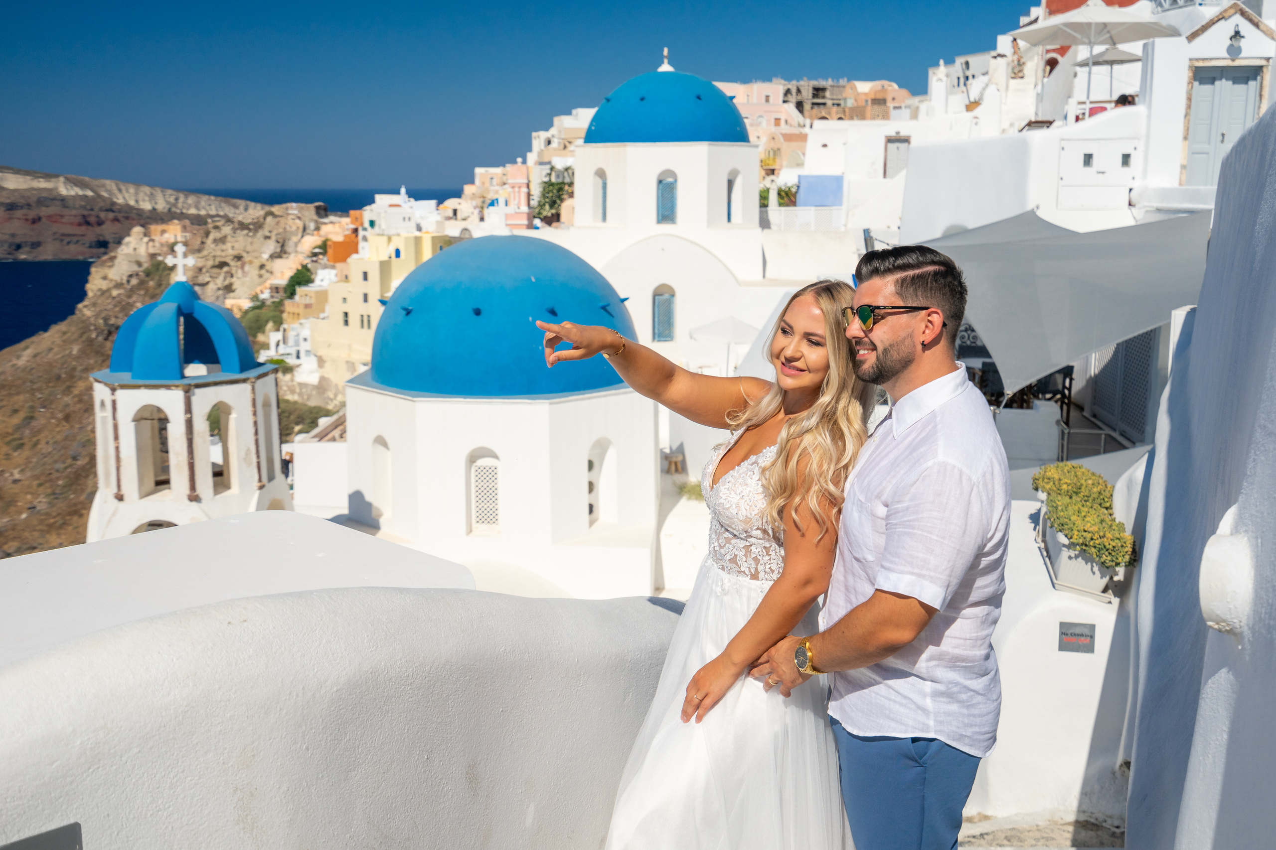 Wedding photographer in Santorini. Photographer in Santorini SokoLOVE Alex| Flying Dress Santorini