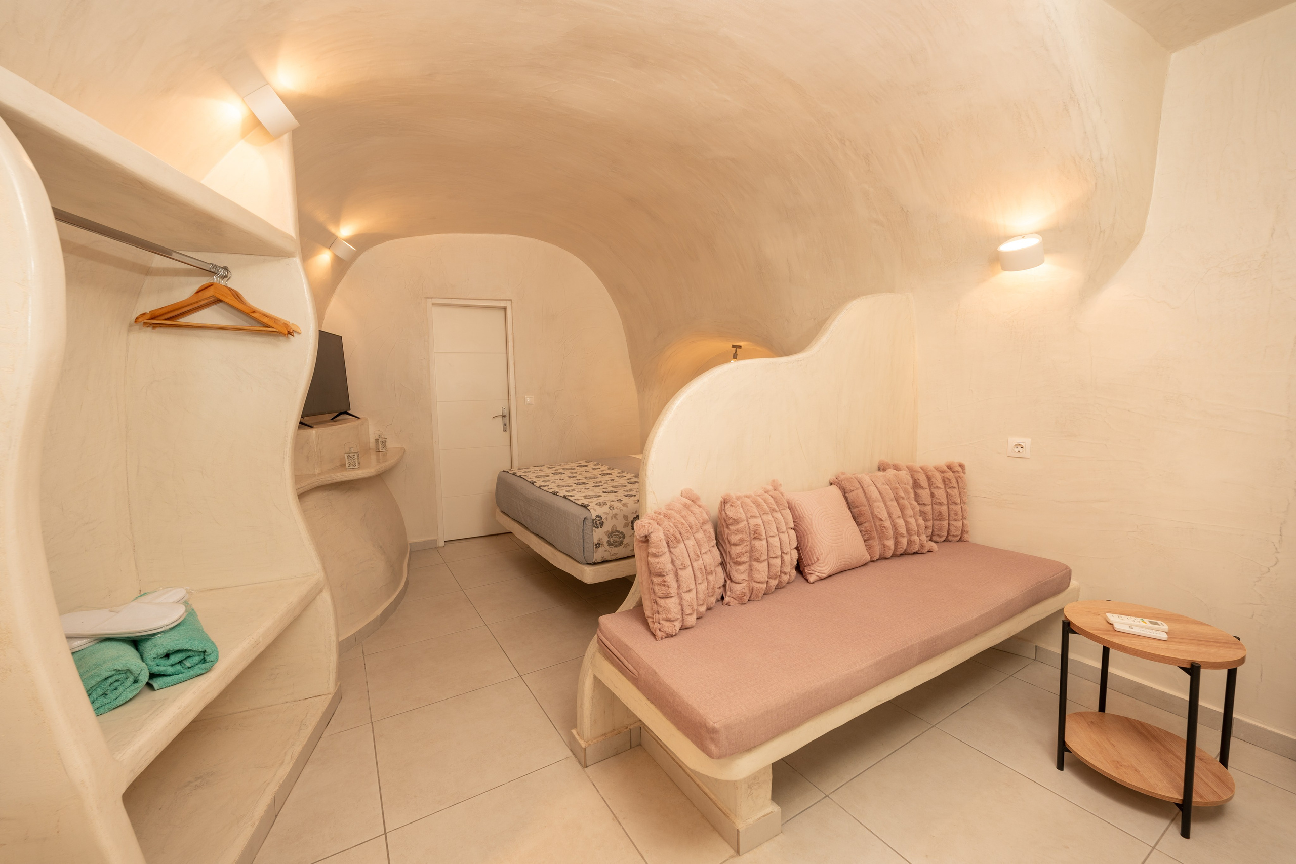 Hotel caves in Oia. Flying Dress Santorini Photographer | SokoLOVE — Book 2026