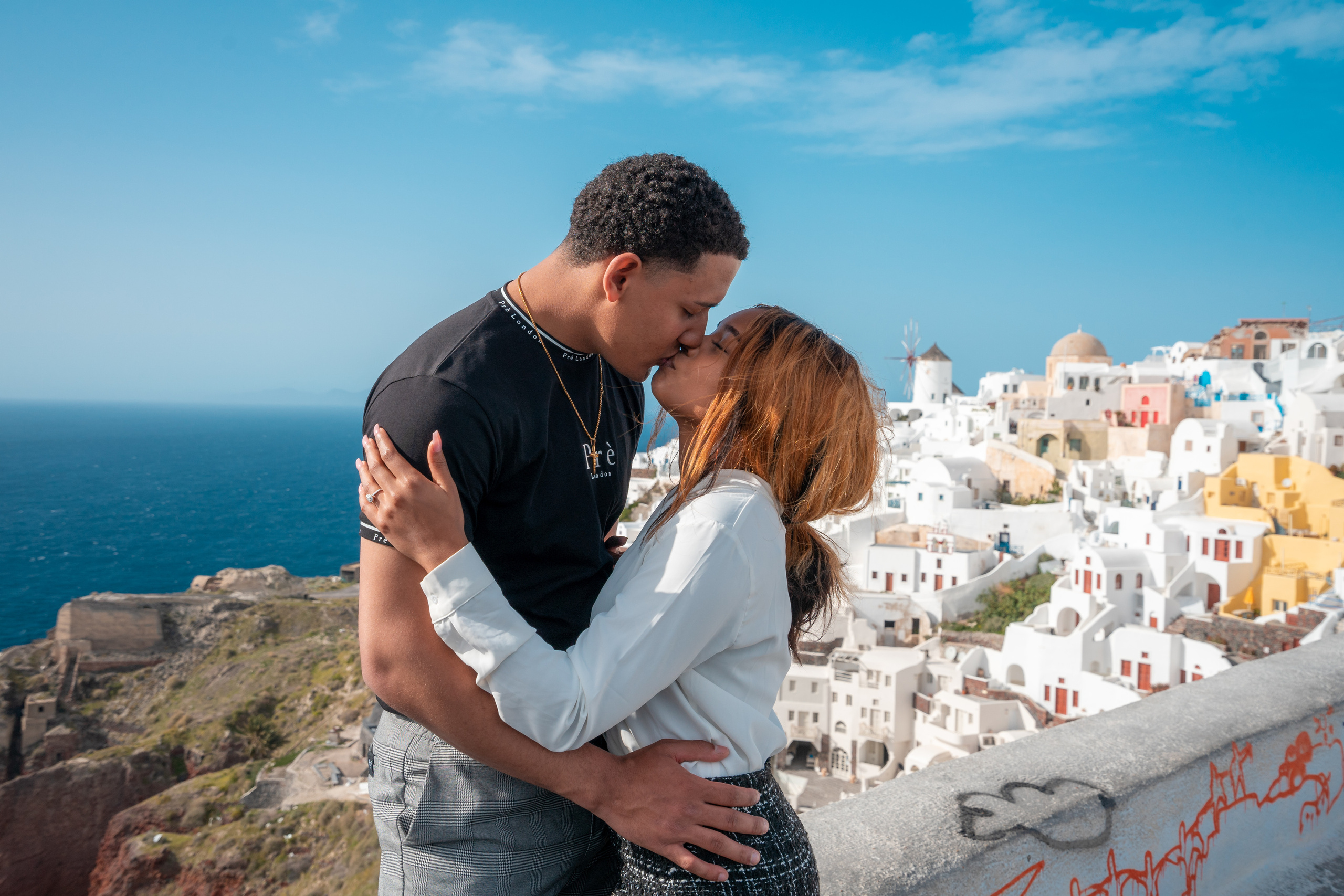 Romantic Proposal in Oia – The Perfect Santorini Engagement. Photographer in Santorini SokoLOVE Alex| Flying Dress Santorini